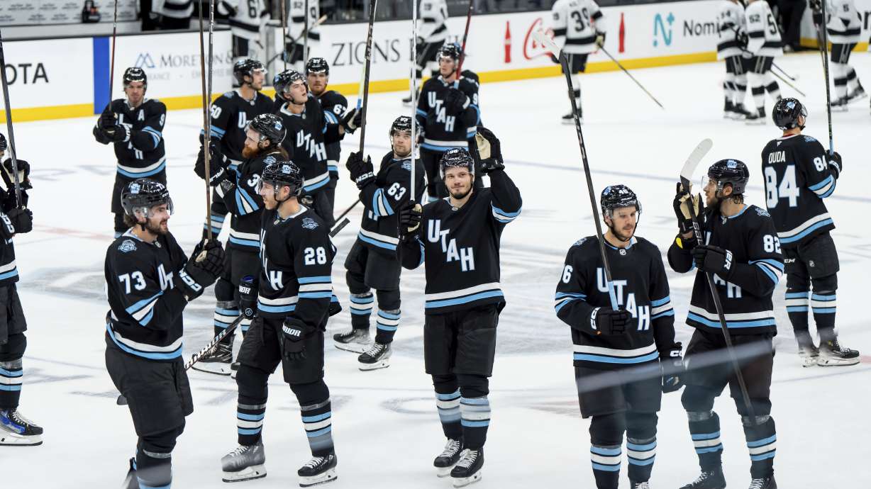 The Utah Hockey Club celebrates their win over the Los Angeles Kings in overtime in a preseason NHL hockey game, Monday, Sept. 23, 2024, in Salt Lake City.