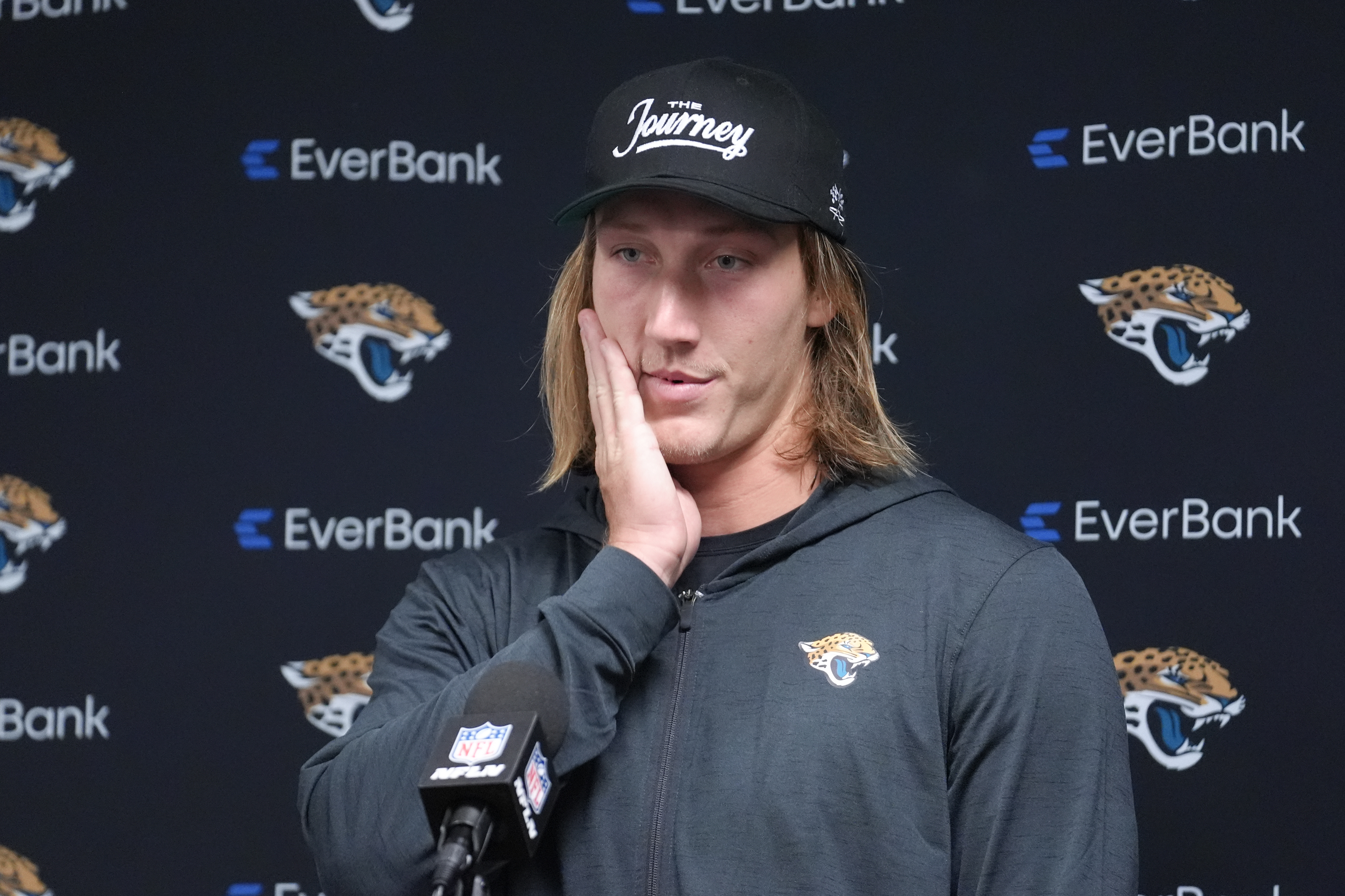 Jacksonville Jaguars quarterback Trevor Lawrence answers questions after an NFL football game against the Buffalo Bills, Monday, Sept. 23, 2024, in Orchard Park, NY.