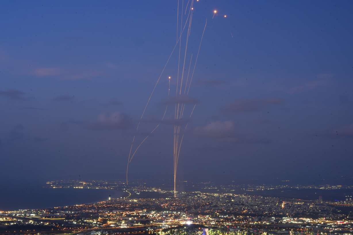 Israeli Iron Dome air defense system fires to intercept rockets that were launched from Lebanon, as seen from Haifa, northern Israel, Monday.