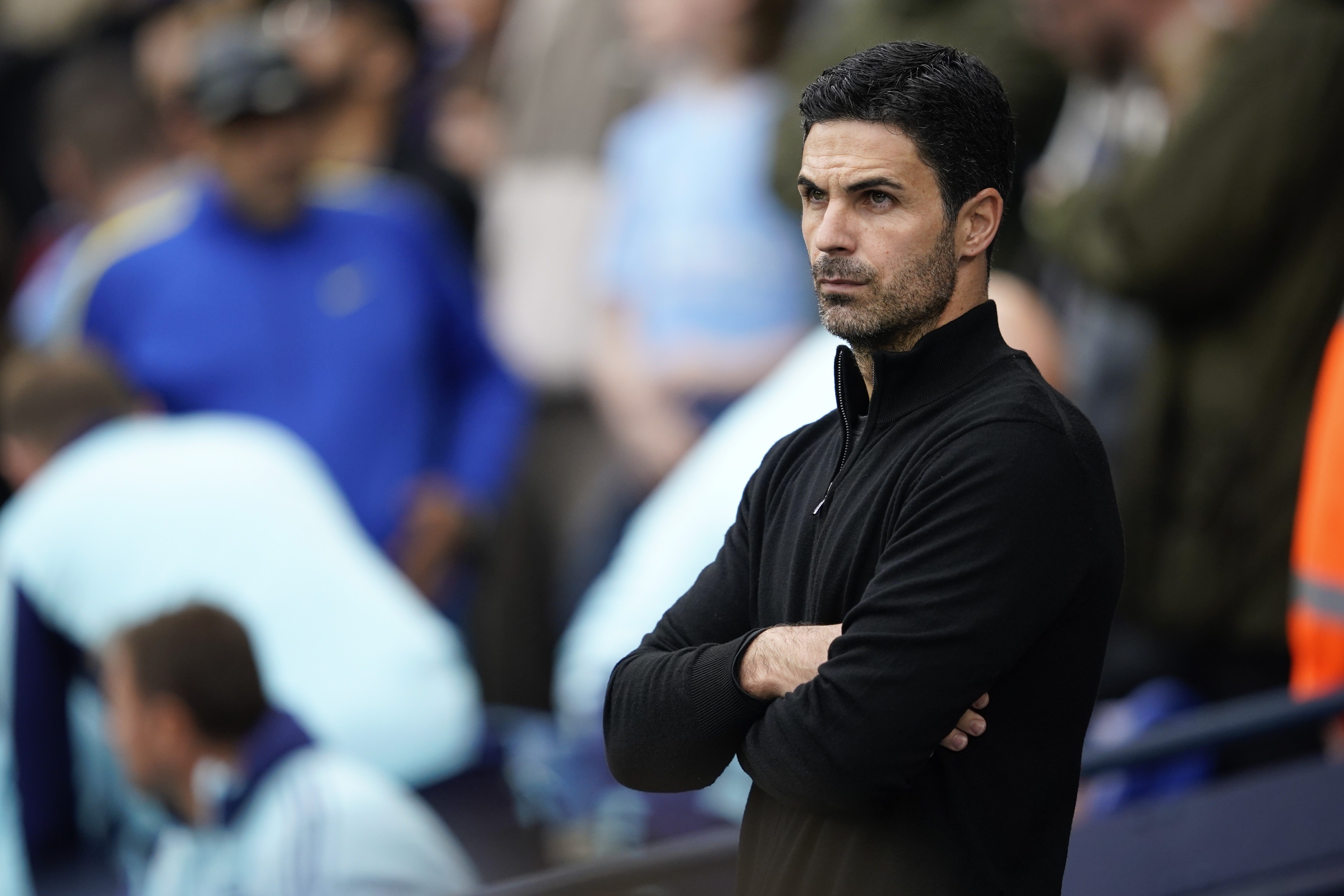 Arsenal's manager Mikel Arteta stands on the touchline before the English Premier League soccer match between Manchester City and Arsenal at the Etihad stadium in Manchester, England, Sunday, Sept. 22, 2024. 