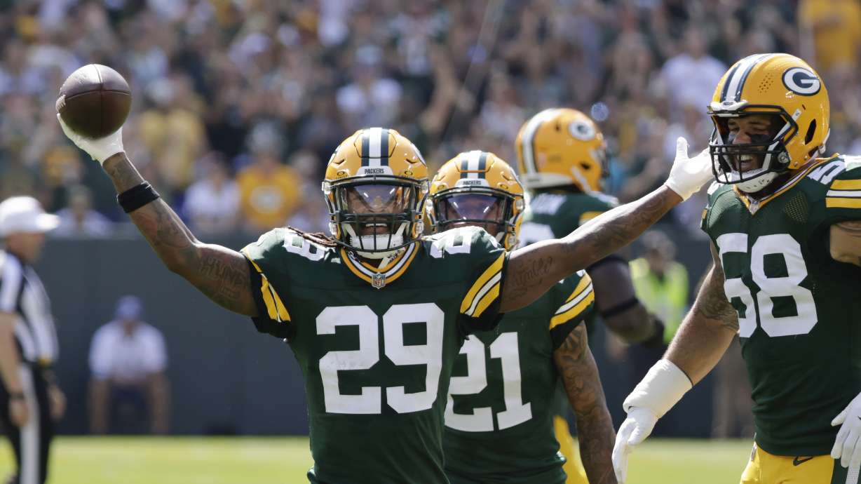 Green Bay Packers safety Xavier McKinney (29) reacts after intercepting a pass during the first half of an NFL football game against the Indianapolis Colts Sunday, Sept. 15, 2024, in Green Bay, Wis.