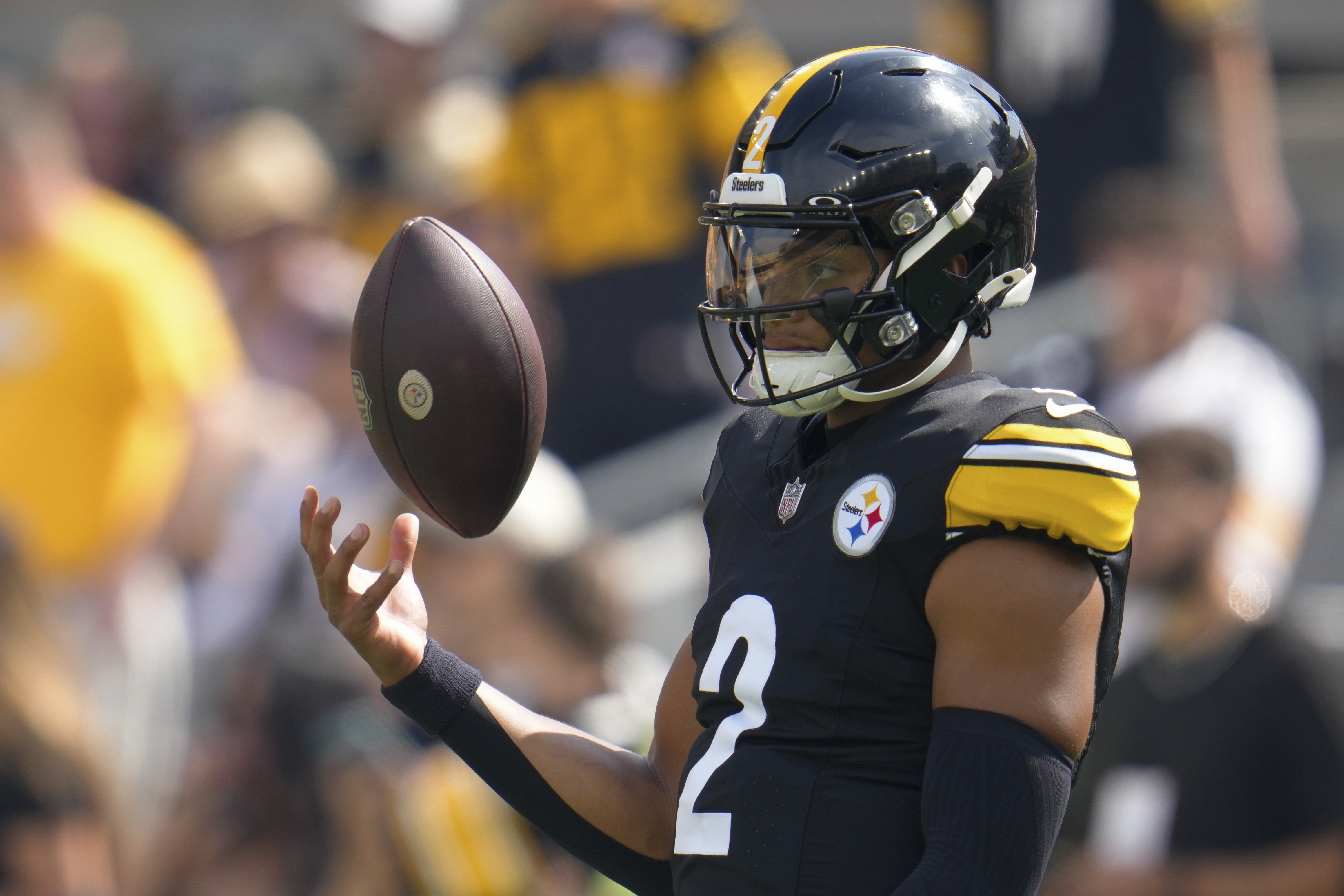 Pittsburgh Steelers quarterback Justin Fields warms up before an NFL football game against the Los Angeles Chargers, Sunday in Pittsburgh, Sept. 22, 2024. 