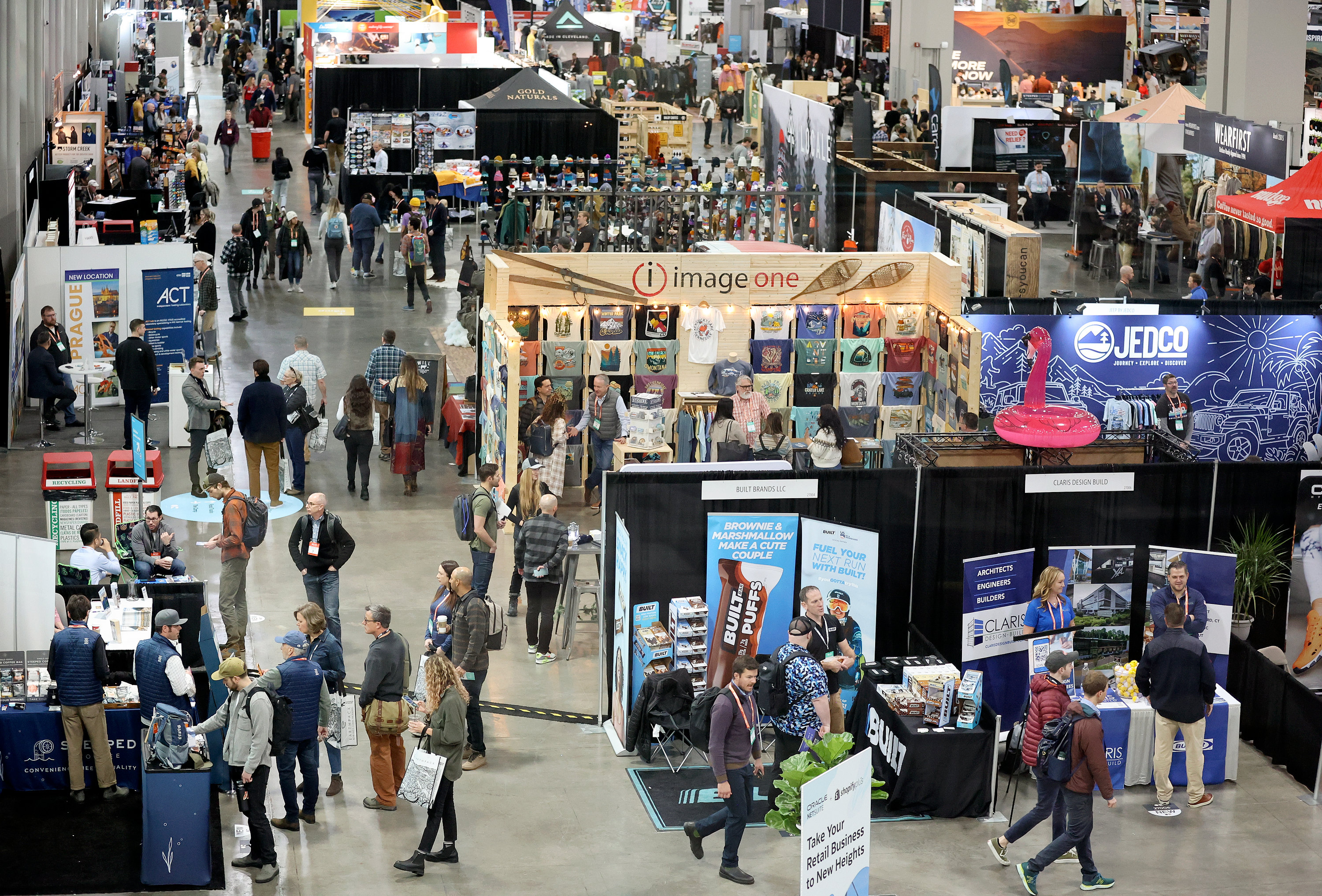 People walk through the Outdoor Retailer Snow Show at the Salt Palace Convention Center in Salt Lake City on Jan. 10, 2023.