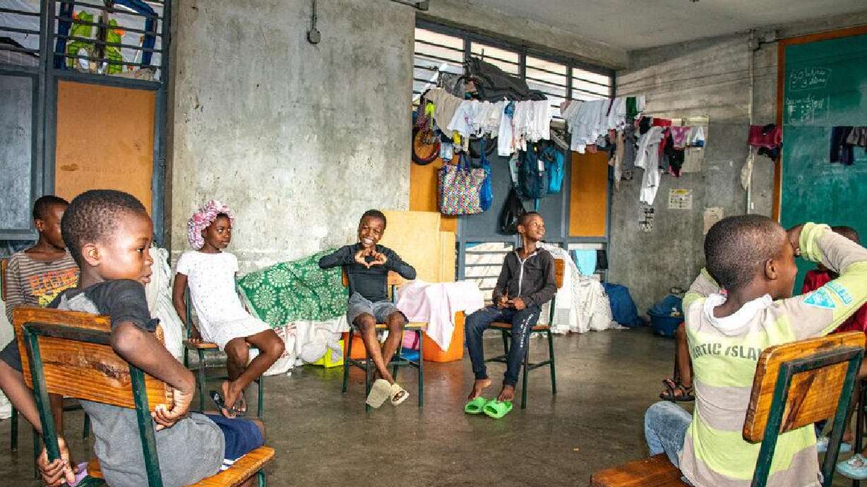 A group of children whose parents are internally displaced play games at school in Port-au-Prince, Haiti. The Church of Jesus Christ of Latter-day Saints made an $8 million to support a homegrown school meals program in Haiti.