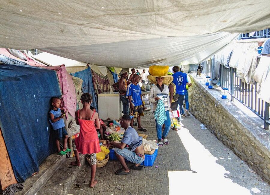 Shelter tents are set up in a corridor of the Argentine Bellegarde National School in Port-au-Prince, where an economic activity has been developed by internally displaced persons, to generate funds to cover their food needs or repay debts.