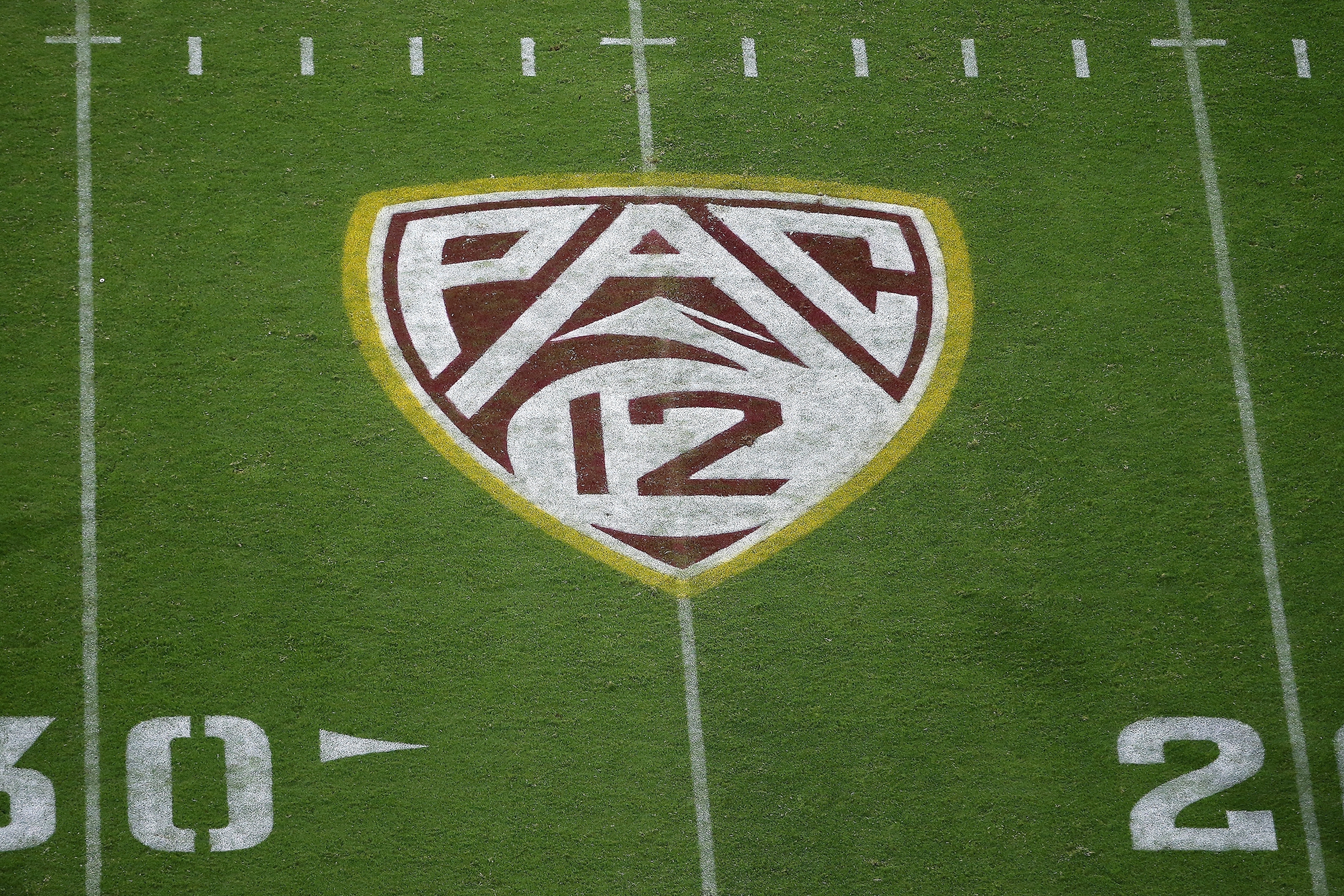 FILE - The Pac-12 logo at Sun Devil Stadium during the second half of an NCAA college football game between Arizona State and Kent State in Tempe, Ariz., Aug. 29, 2019. 
