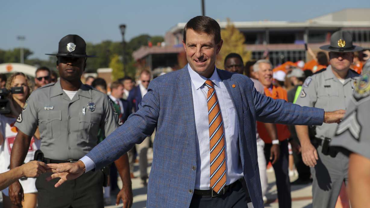 Clemson head coach Dabo Swinney greets fans during the Tiger Walk before an NCAA college football game against North Carolina State Saturday, Sept. 21, 2024, in Clemson, S.C.