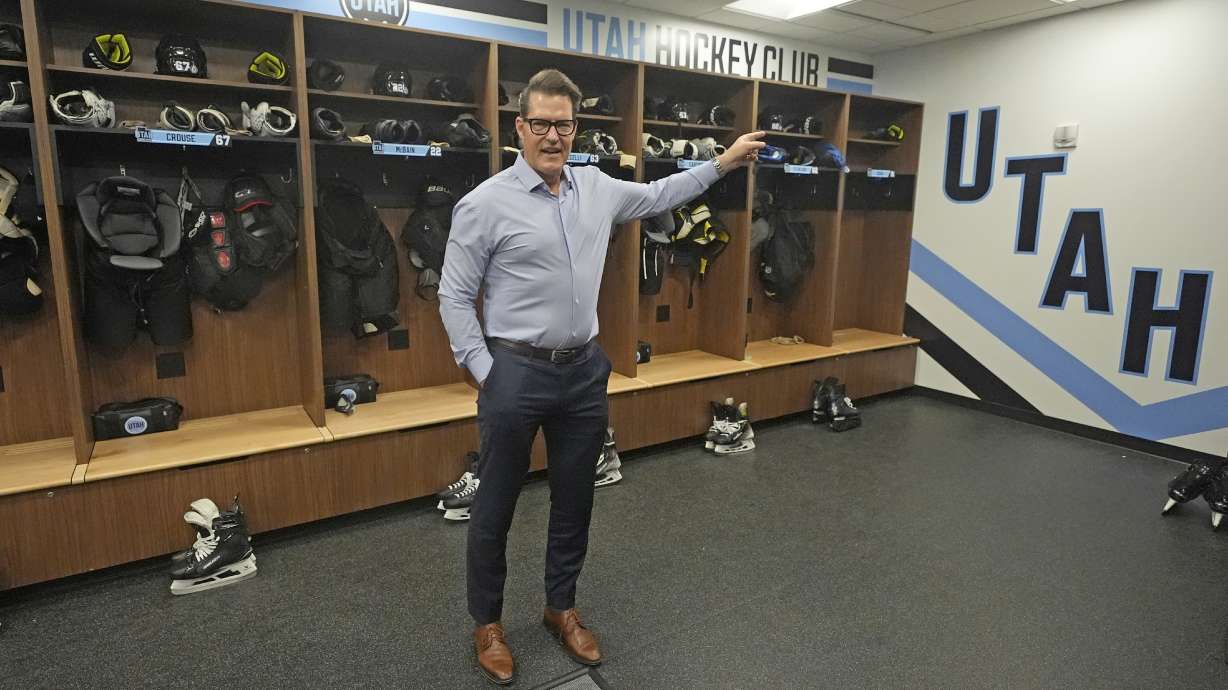 Utah Hockey Club general manager Bill Armstrong points during a tour of the new temporary practice facility locker room at the Olympic Oval Tuesday, Sept. 17, 2024, in Kearns, Utah.