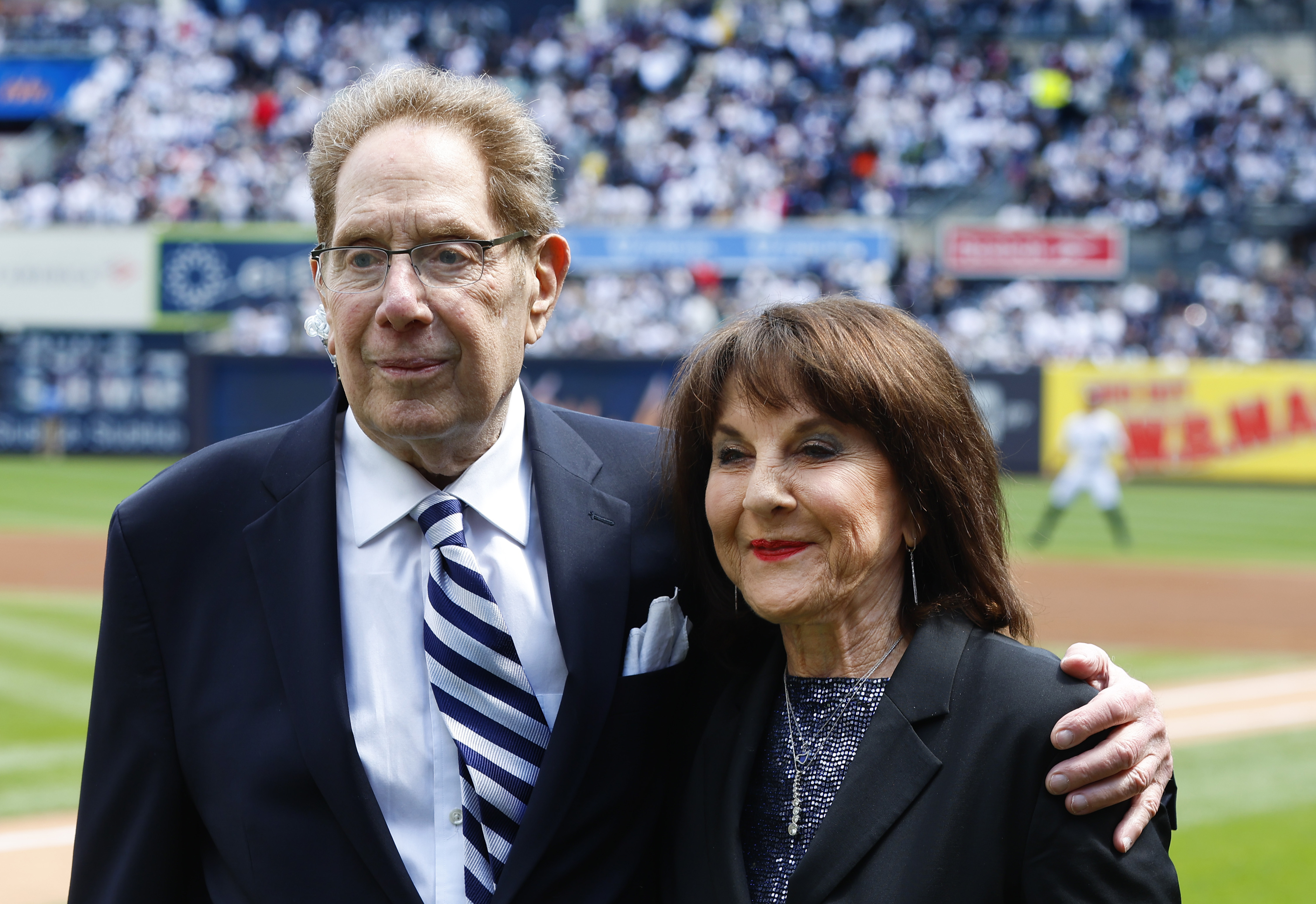 FILE 0 New York Yankees broadcasters John Sterling and Suzyn Waldman pose during a retirement ceremony for Sterling before a baseball game against the Tampa Bay Rays at Yankee Stadium in New York, Saturday, April 20, 2024. 