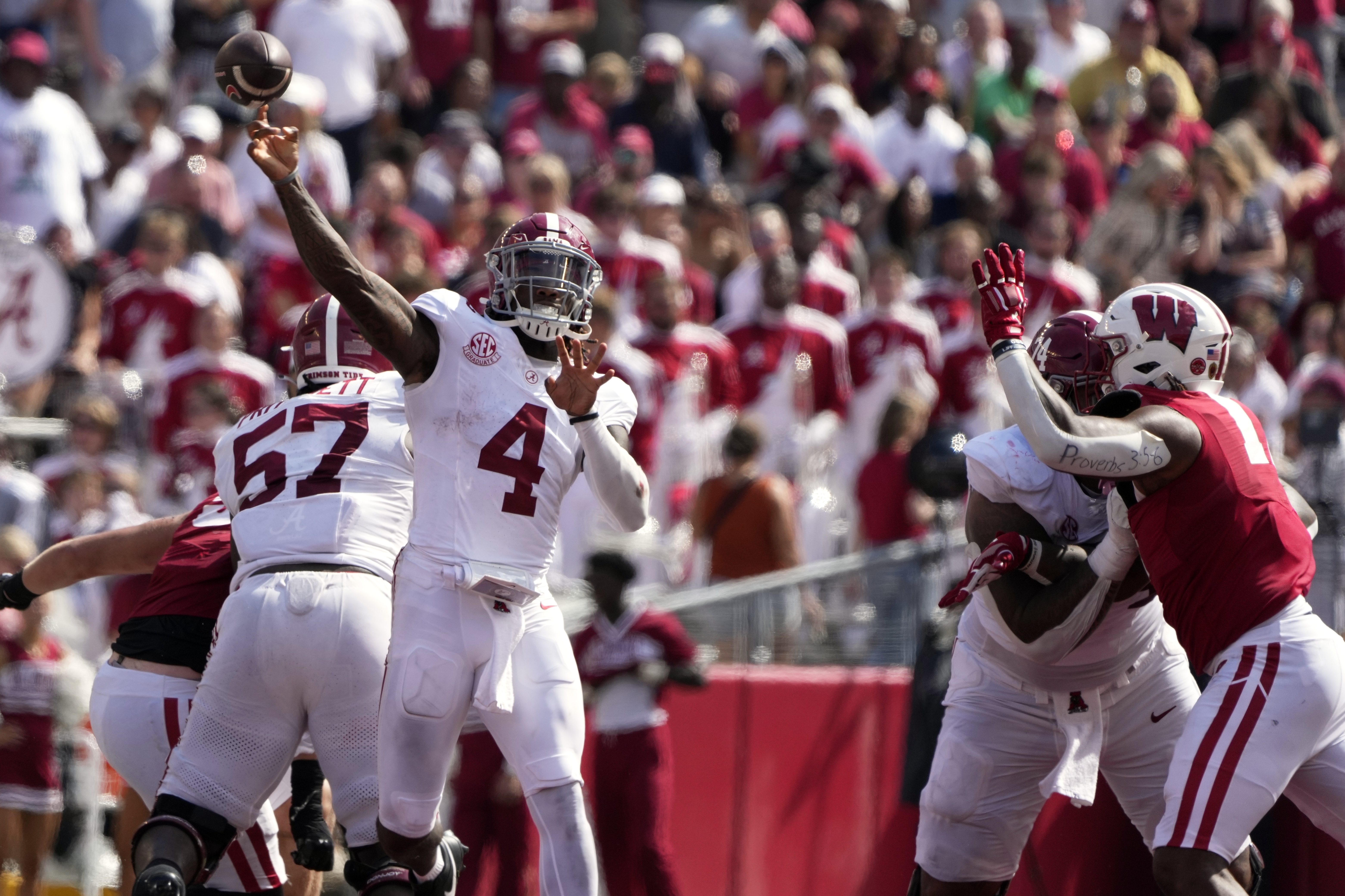 Alabama's Jalen Milroe (4) thorws a pass during the second half of an NCAA college football game against Wisconsin Saturday, Sept. 14, 2024, in Madison, Wis.