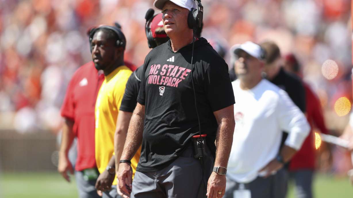 North Carolina State head coach Dave Doeren watches an instant replay on the scoreboard during the first half of an NCAA college football game against Clemson Saturday, Sept. 21, 2024, in Clemson, S.C.