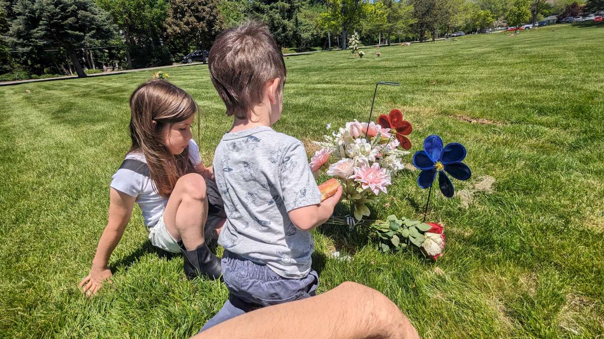 Rachel and Todd Smith’s daughter and son at Rachel’s gravesite. Photo courtesy of Todd Smith.