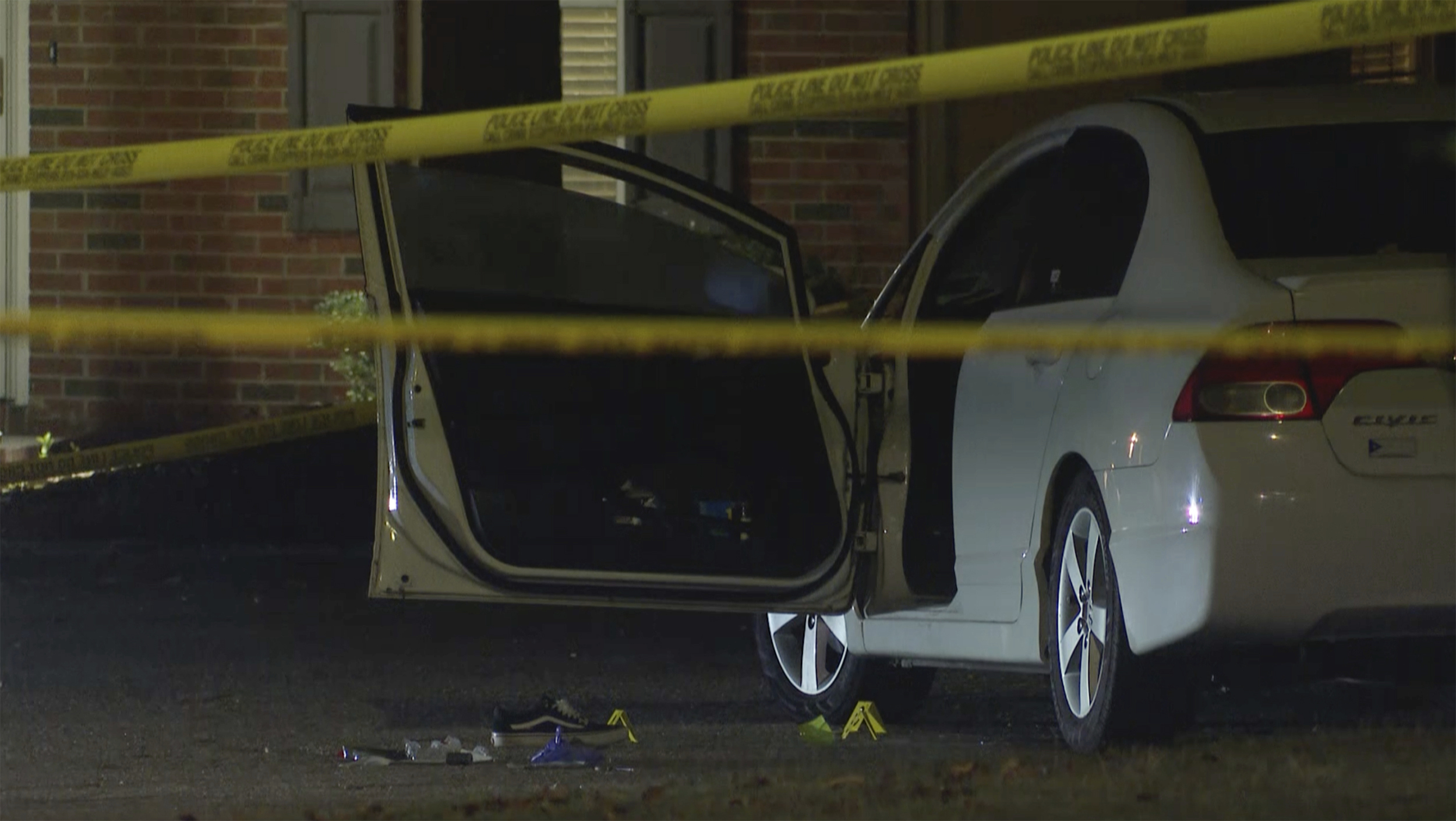 Law enforcement officers work a crime scene in the Hedingham neighborhood and Neuse River Trail area in Raleigh, N.C., on Oct. 13, 2022. The father of a teenager accused in a 2022 mass shooting in North Carolina that left five people dead has pleaded guilty to improperly storing a handgun.