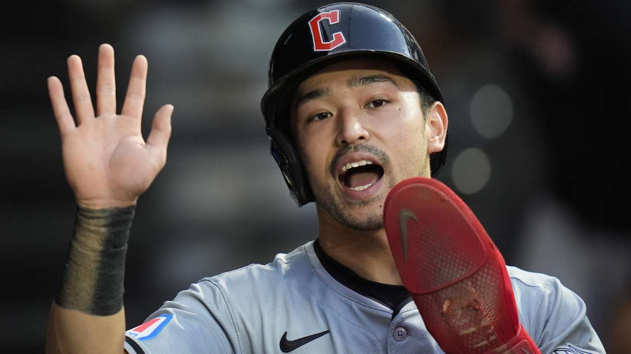 Cleveland Guardians' Steven Kwan celebrates after scoring on a single by Josh Naylor during the first inning of a baseball game against the Chicago White Sox, Monday, Sept. 9, 2024, in Chicago.