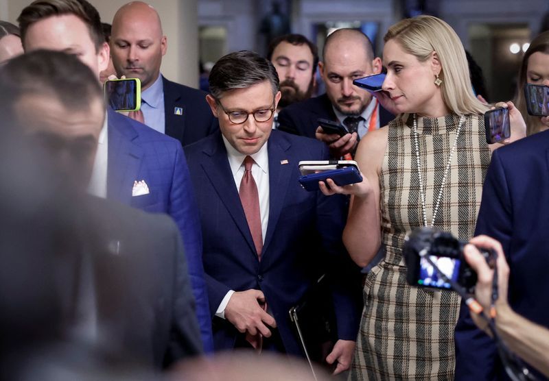 Speaker of the House Mike Johnson (R-LA) walks to a vote on a stopgap bill to keep the federal government funded for another three months and avert a month-end partial shutdown, at the U.S. Capitol in Washington, Wednesday.