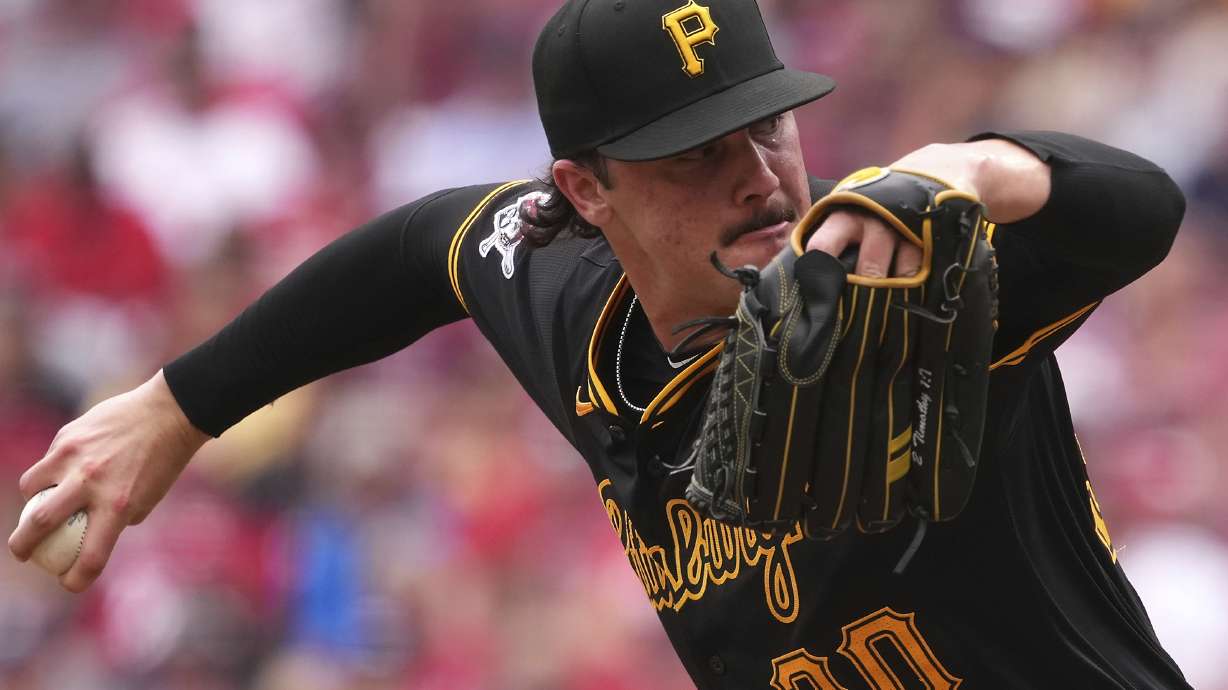 Pittsburgh Pirates' Paul Skenes delivers a pitch during the fourth inning of a baseball game against the Cincinnati Reds, Sunday, Sept. 22, 2024, in Cincinnati.