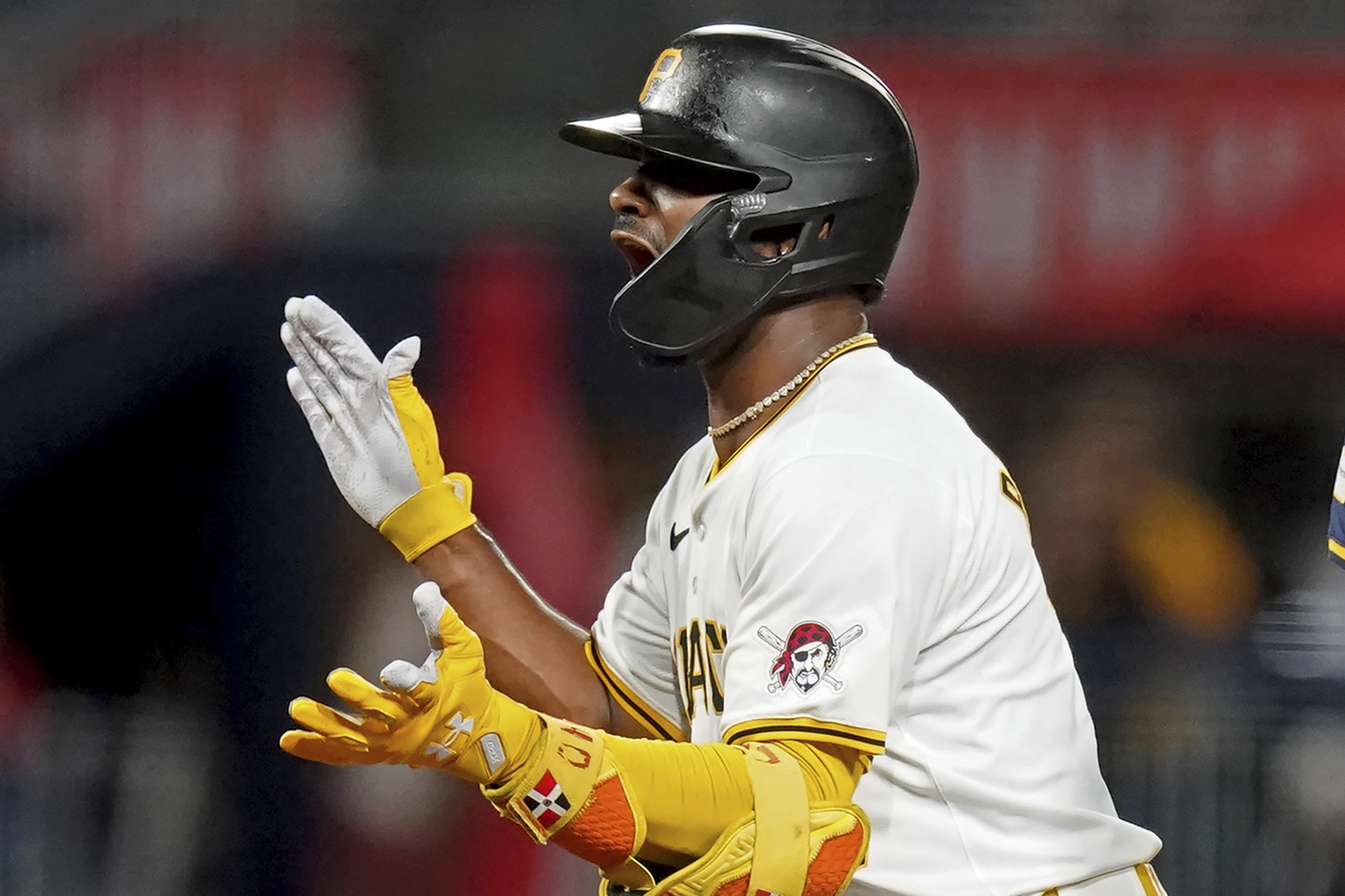 Pittsburgh Pirates' Liover Peguero celebrates after hitting an RBI double during the fifth inning of a baseball game against the Milwaukee Brewers, Wednesday, Sept. 25, 2024, in Pittsburgh.