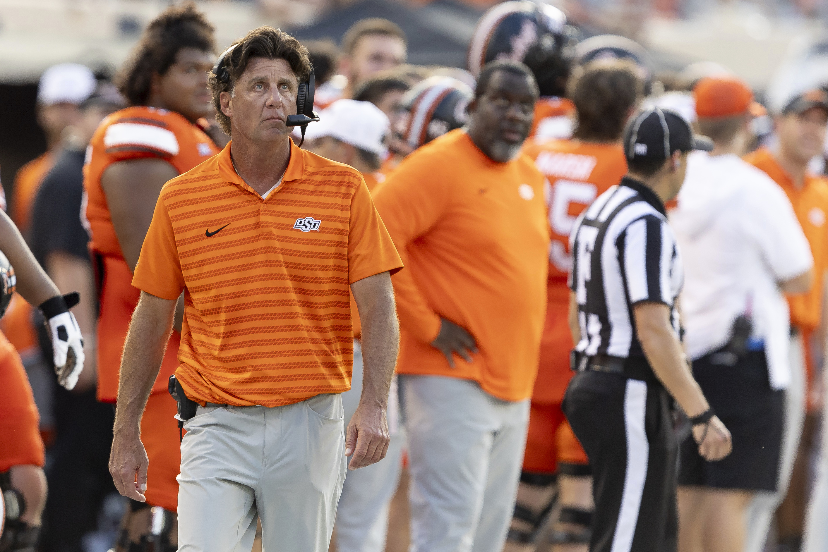 Oklahoma State head coach Mike Gundy walks the sideline in the second half of an NCAA college football game against Utah, Saturday, Sept. 21, 2024, in Stillwater, Okla. 