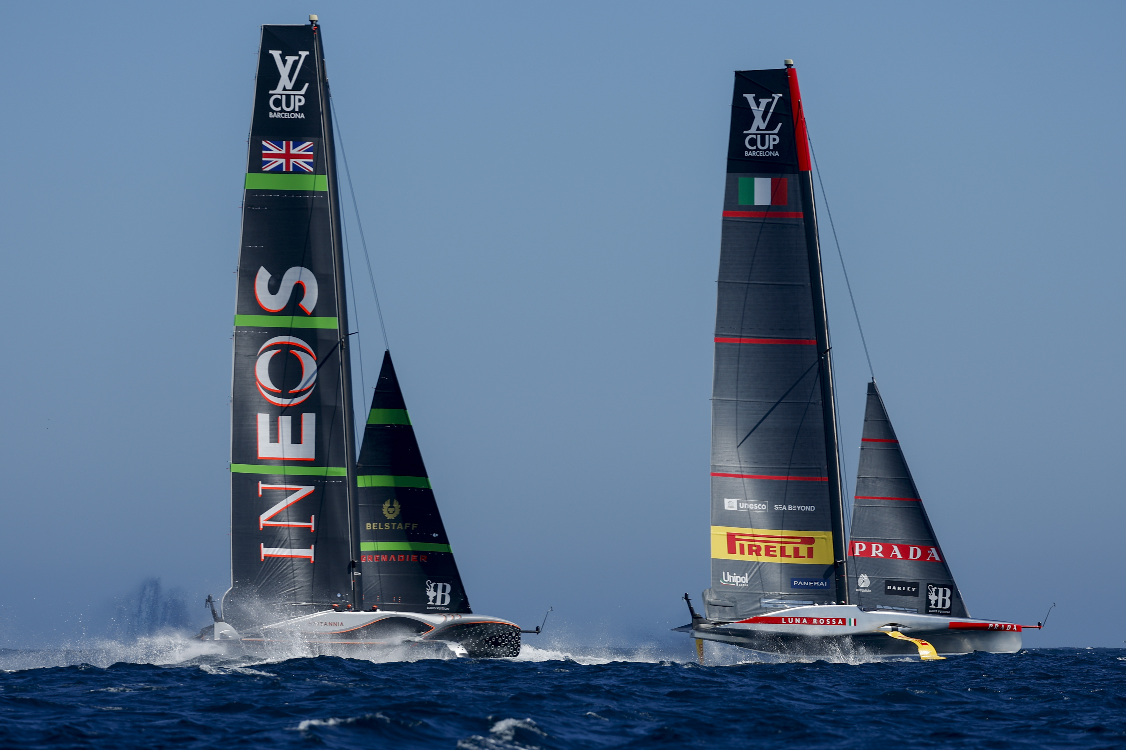 INEOS Britannia's AC75, left, and Luna Rosa Prada Pirelli Team's AC75 boat sail during Final America's Cup Regatta ahead of the 37th America's Cup sailing race at the Barcelona's coast, Spain, Thursday, Sep. 26, 2024. 