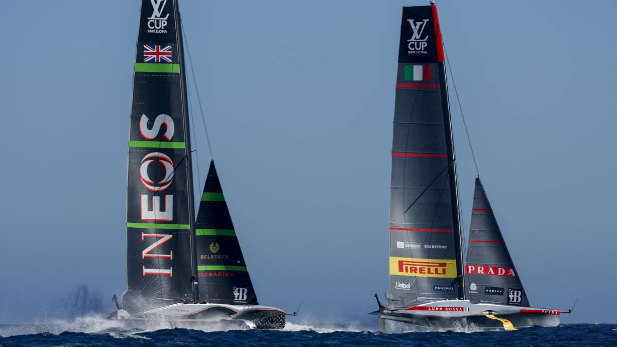 INEOS Britannia's AC75, left, and Luna Rosa Prada Pirelli Team's AC75 boat sail during Final America's Cup Regatta ahead of the 37th America's Cup sailing race at the Barcelona's coast, Spain, Thursday, Sep. 26, 2024.