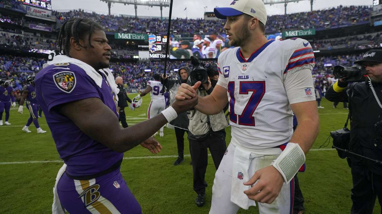 FILE - Baltimore Ravens quarterback Lamar Jackson, left, and Buffalo Bills quarterback Josh Allen (17) shake hands after an NFL football game Sunday, Oct. 2, 2022, in Baltimore.