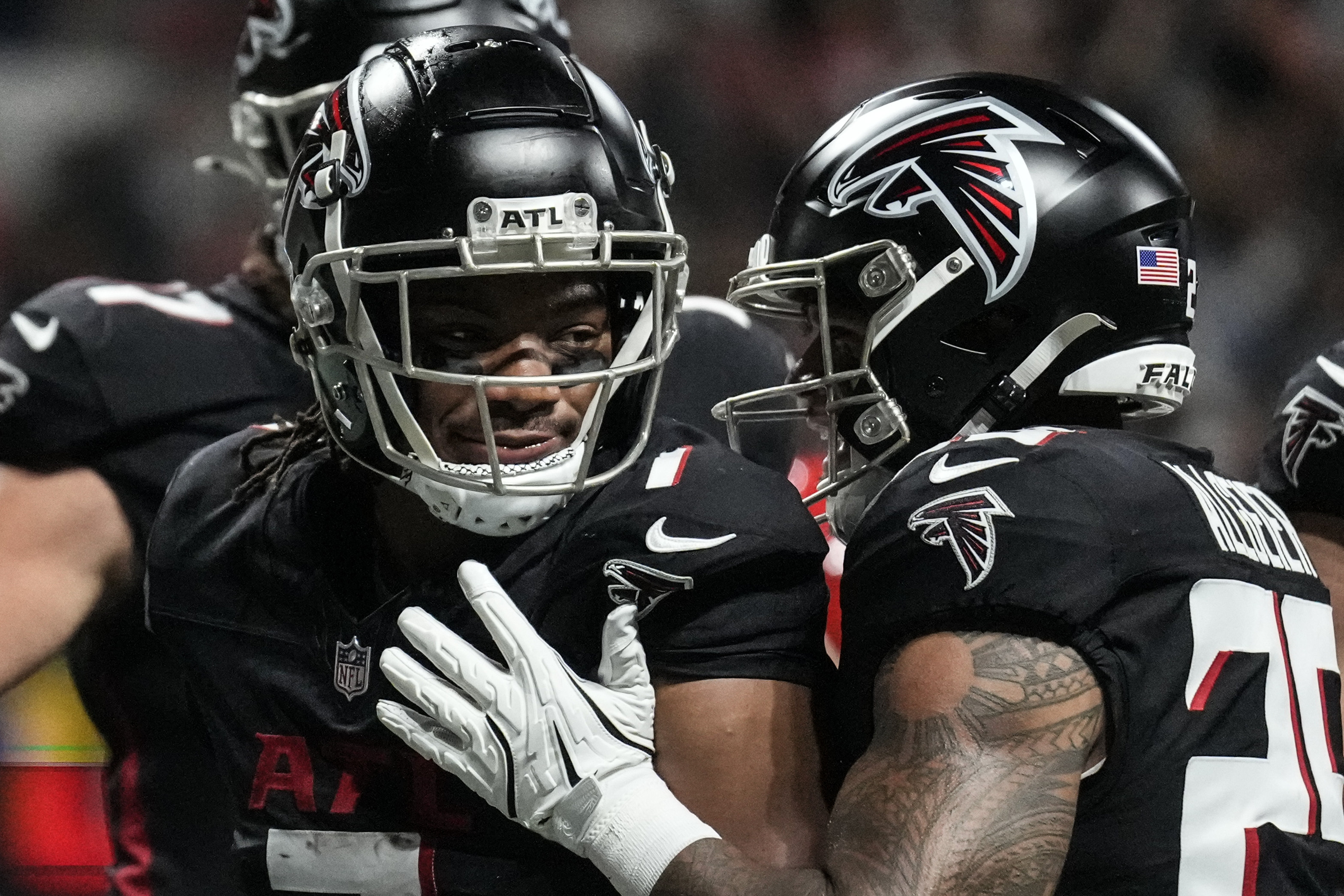 Atlanta Falcons running back Bijan Robinson (7) celebrates his touchdown against the Kansas City Chiefs during the first half of an NFL football game, Sunday, Sept. 22, 2024, in Atlanta. 
