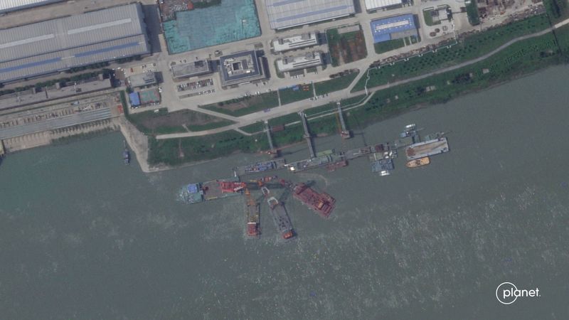 A satellite image from June appears to show cranes at the Wuchang shipyard in Wuhan Shi, China, June 15.