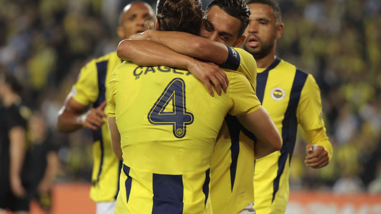 Fenerbahce's players celebrate the opening goal during the Europa League opening phase soccer match between Fenerbahce and Union SG at the Sukru Saracoglu stadium in Istanbul, Turkey, Thursday, Sept. 26, 2024.