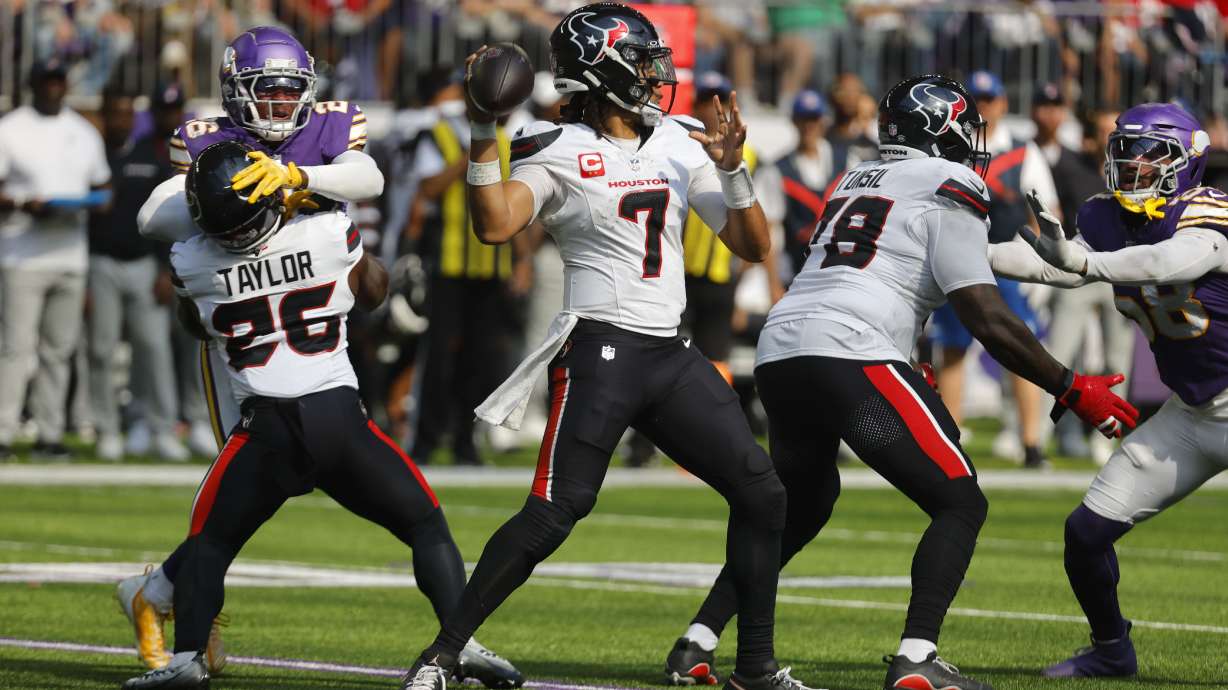 Houston Texans quarterback C.J. Stroud (7) throws a pass during the second half of an NFL football game against the Minnesota Vikings, Sunday, Sept. 22, 2024, in Minneapolis.