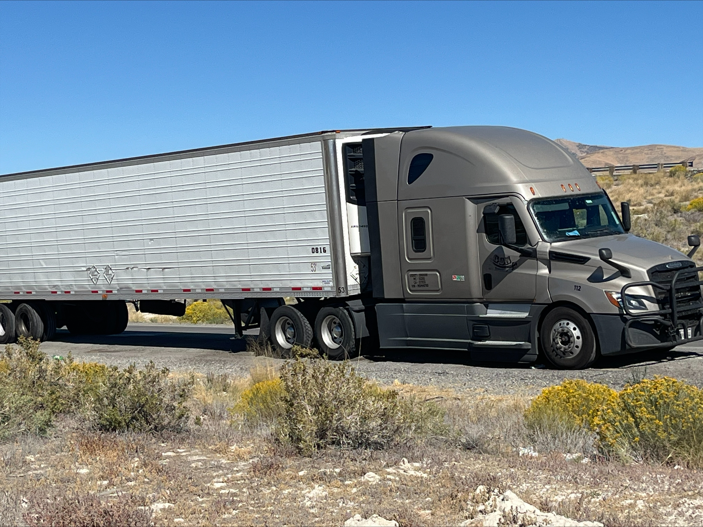 An arrest warrant has been issued for a Washington man accused of killing of a semitruck driver who was found dead in the sleeper of his cab on Sept. 23 in Tooele County. 