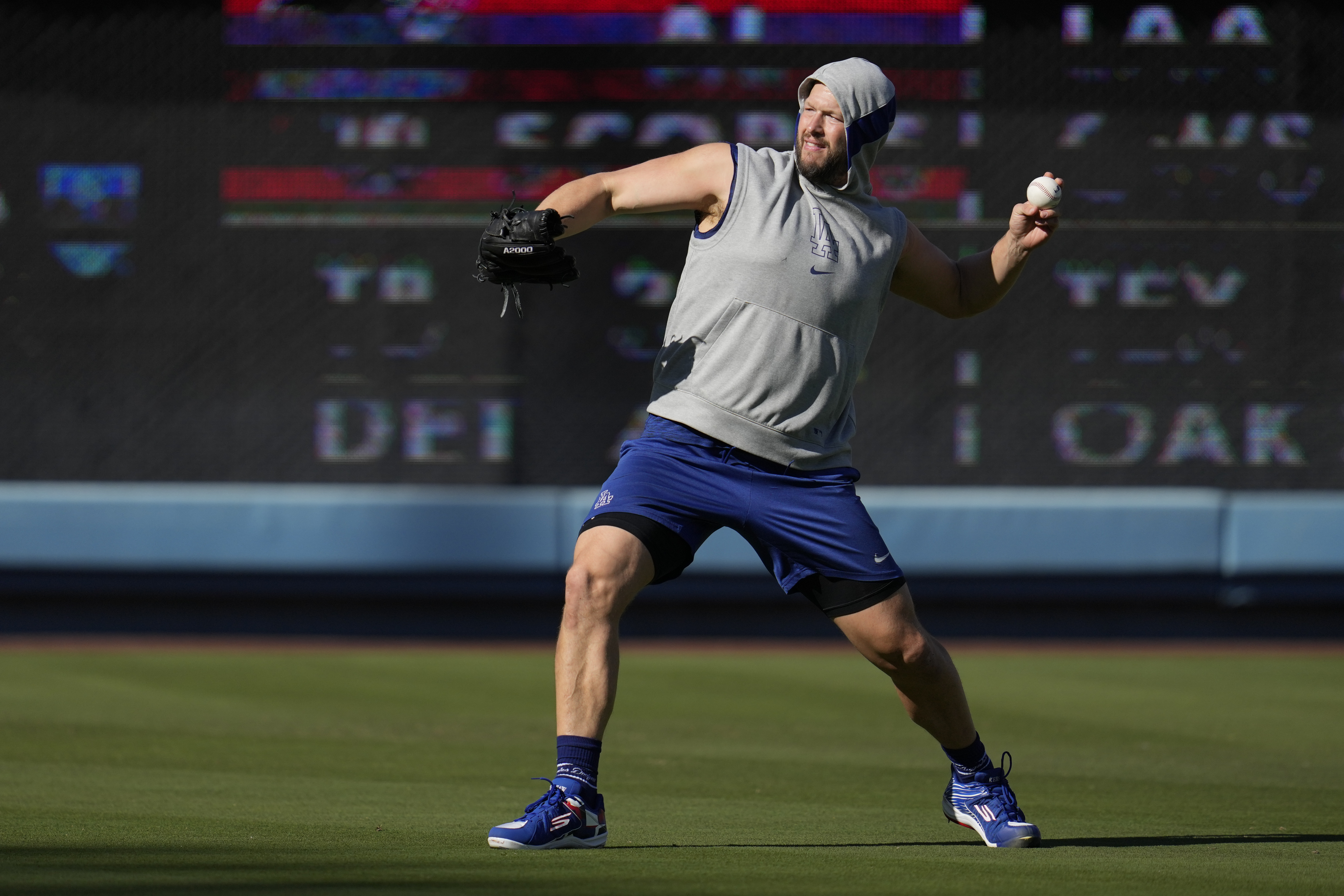 Los Angeles Dodgers pitcher Clayton Kershaw throws before the Los Angeles Dodgers host the San Diego Padres in a baseball game Thursday, Sept. 26, 2024, in Los Angeles.