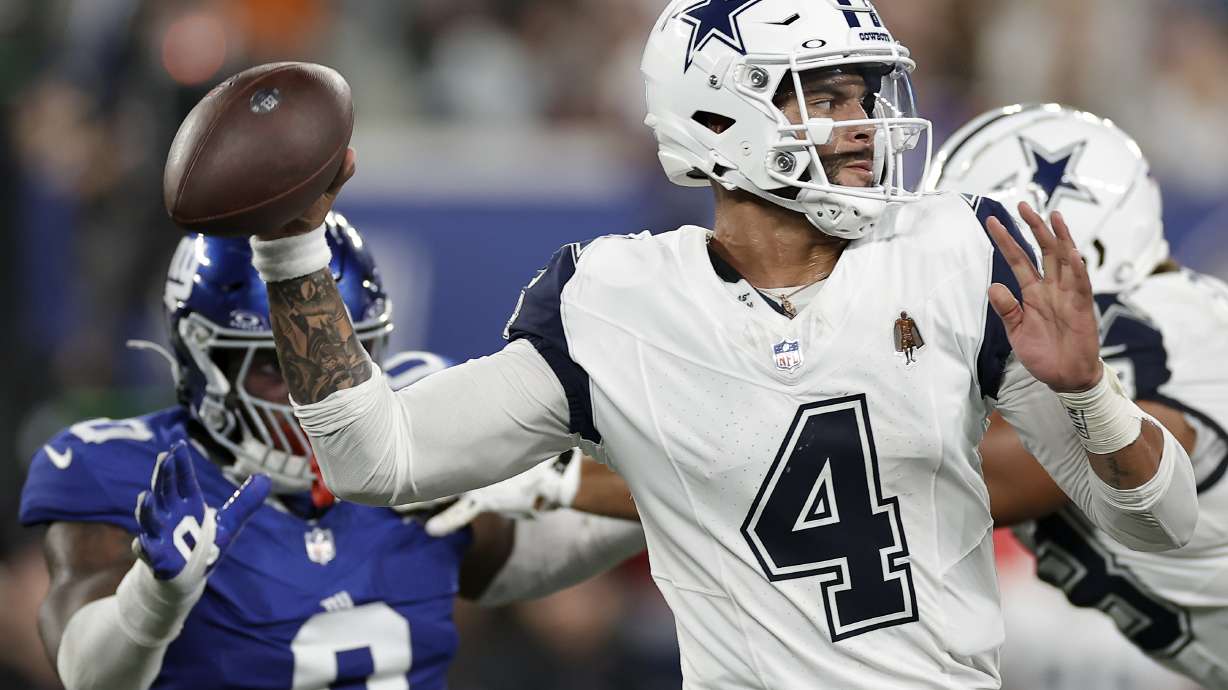 Dallas Cowboys quarterback Dak Prescott (4) passes against the New York Giants during the second quarter of an NFL football game, Thursday, Sept. 26, 2024, in East Rutherford, N.J.