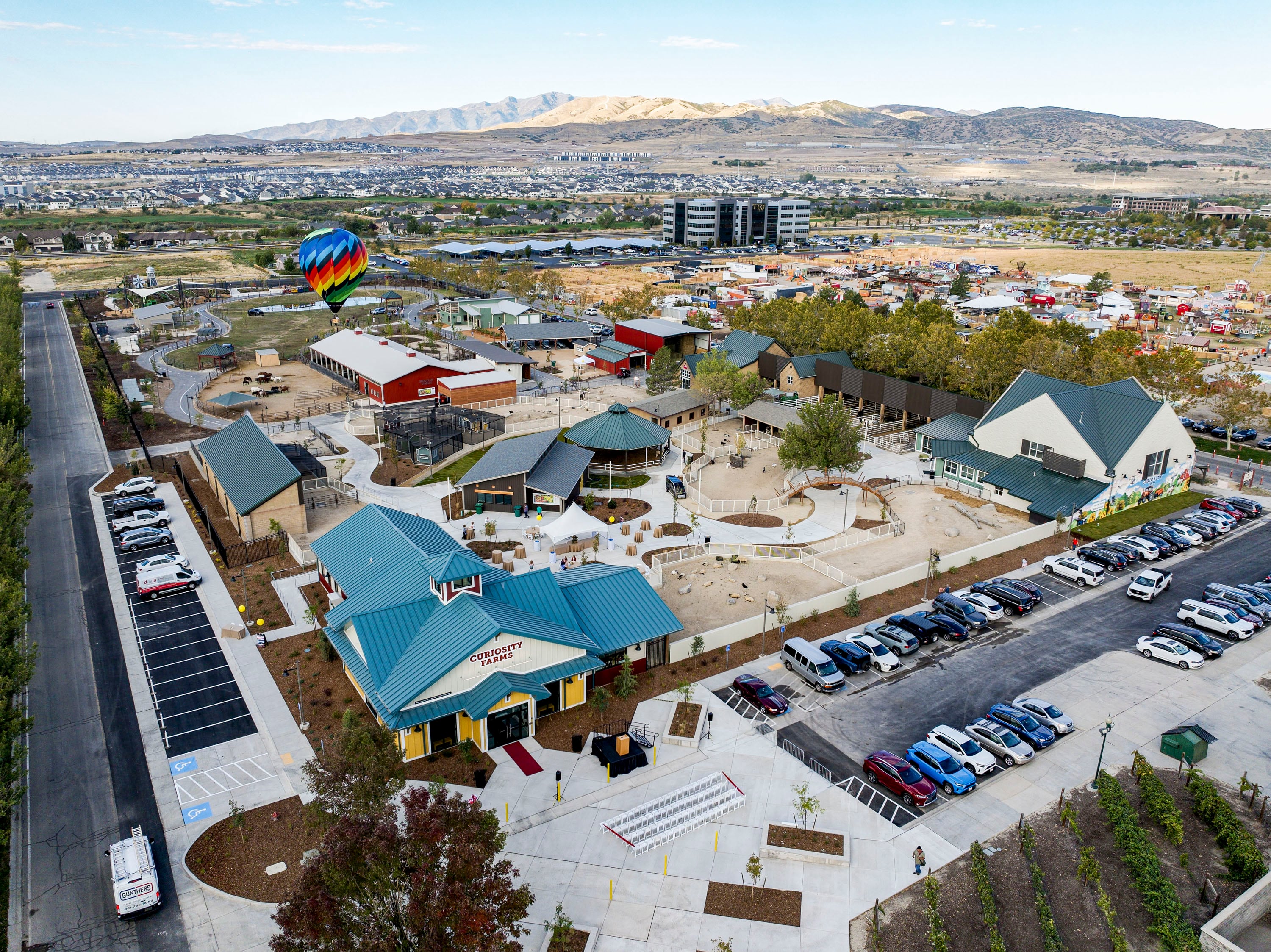 A hot air balloon named Alchemy rises above Curiosity Farms at Thanksgiving Point in Lehi on Thursday. The outdoor venue is an immersive experience for children. 