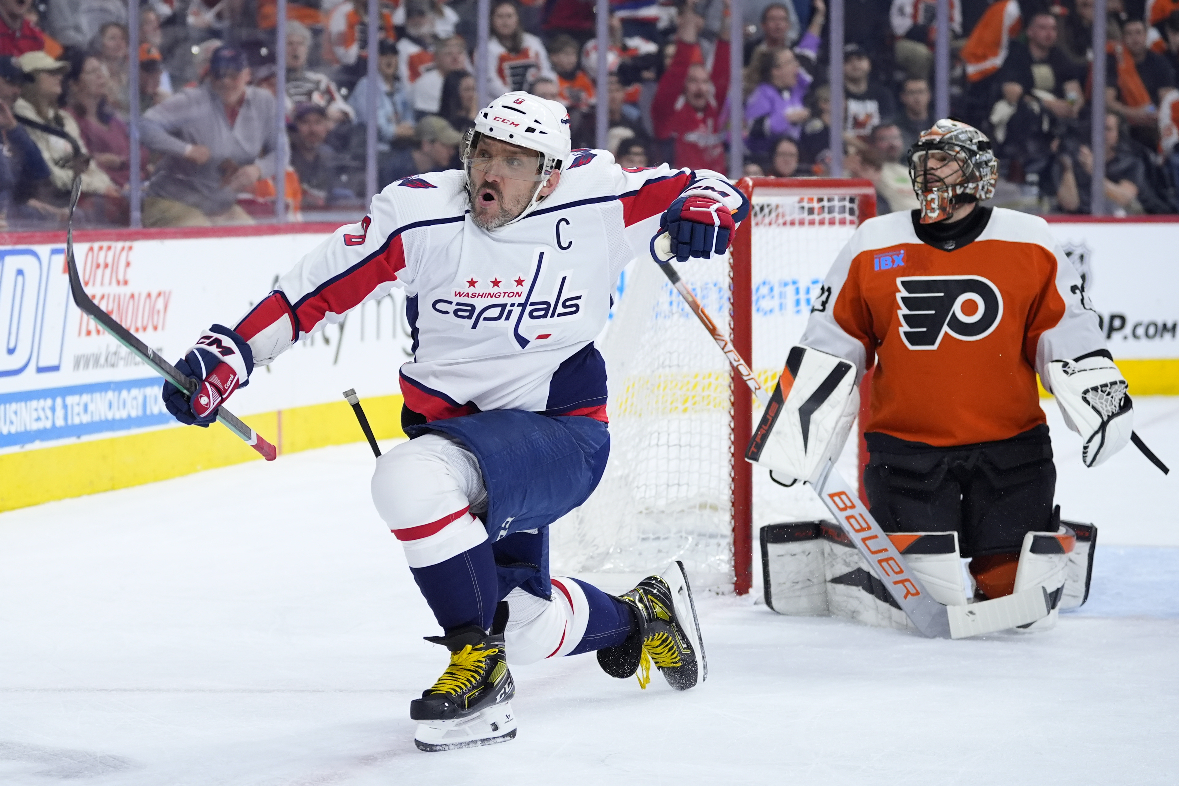 FILE - Washington Capitals' Alex Ovechkin, left, reacts after scoring a goal against Philadelphia Flyers' Samuel Ersson during the first period of an NHL hockey game, Tuesday, April 16, 2024, in Philadelphia.