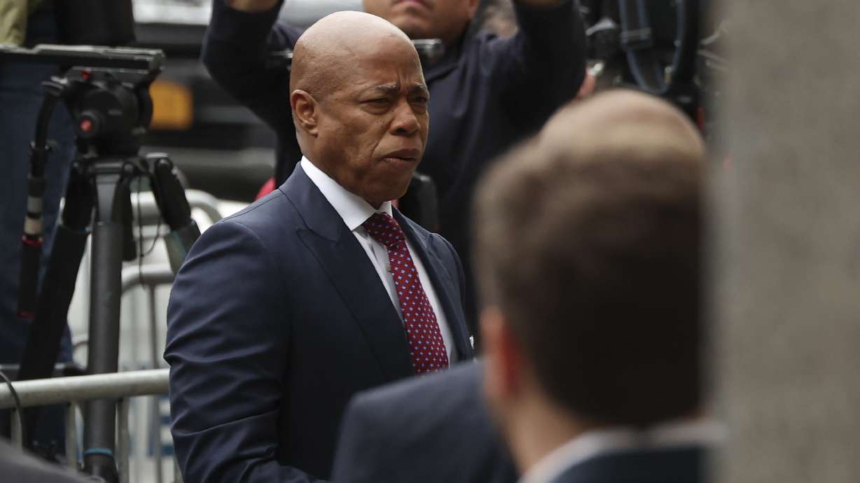 New York City Mayor Eric Adams arrives at Manhattan federal court, Friday, in New York. He pleaded not guilty to taking bribes and illegal campaign contributions.