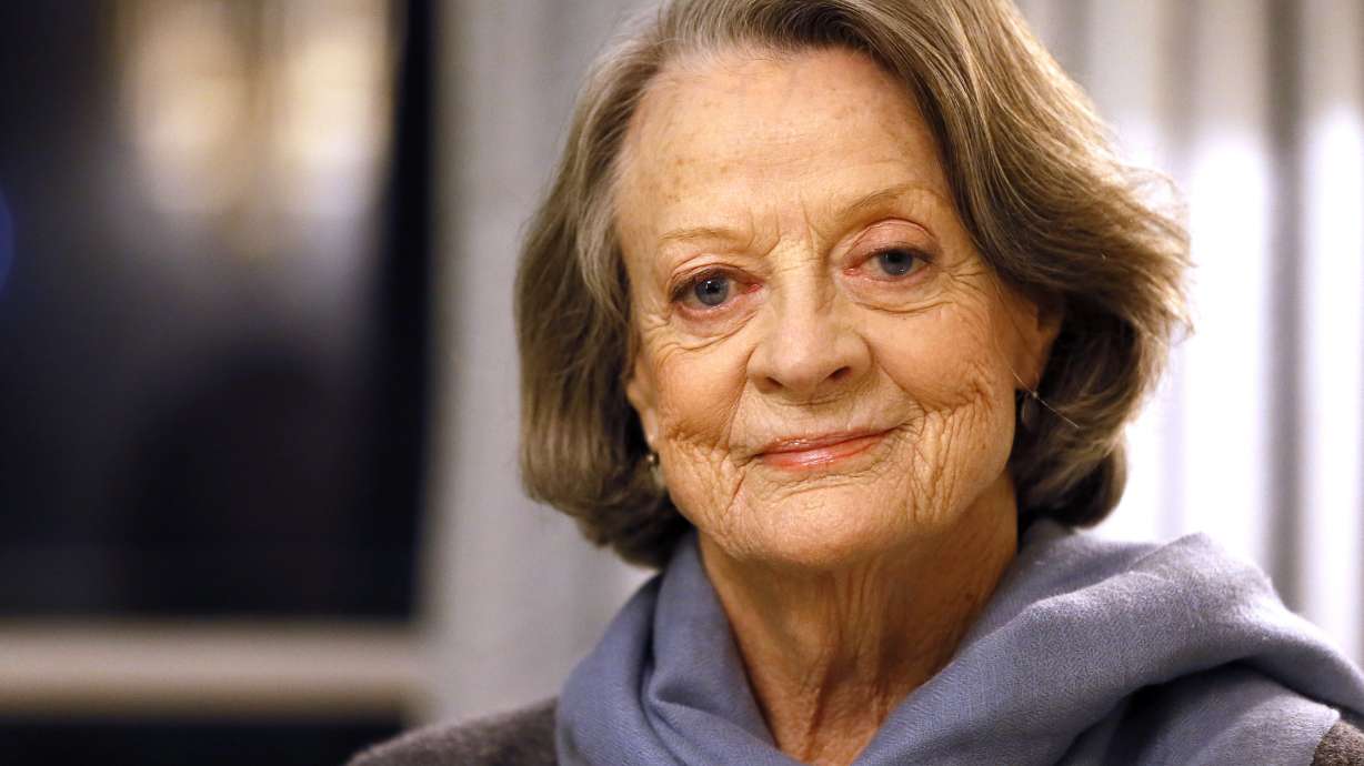 British actress Dame Maggie Smith poses in London on Dec. 16, 2015. She died Friday. She was 89.
