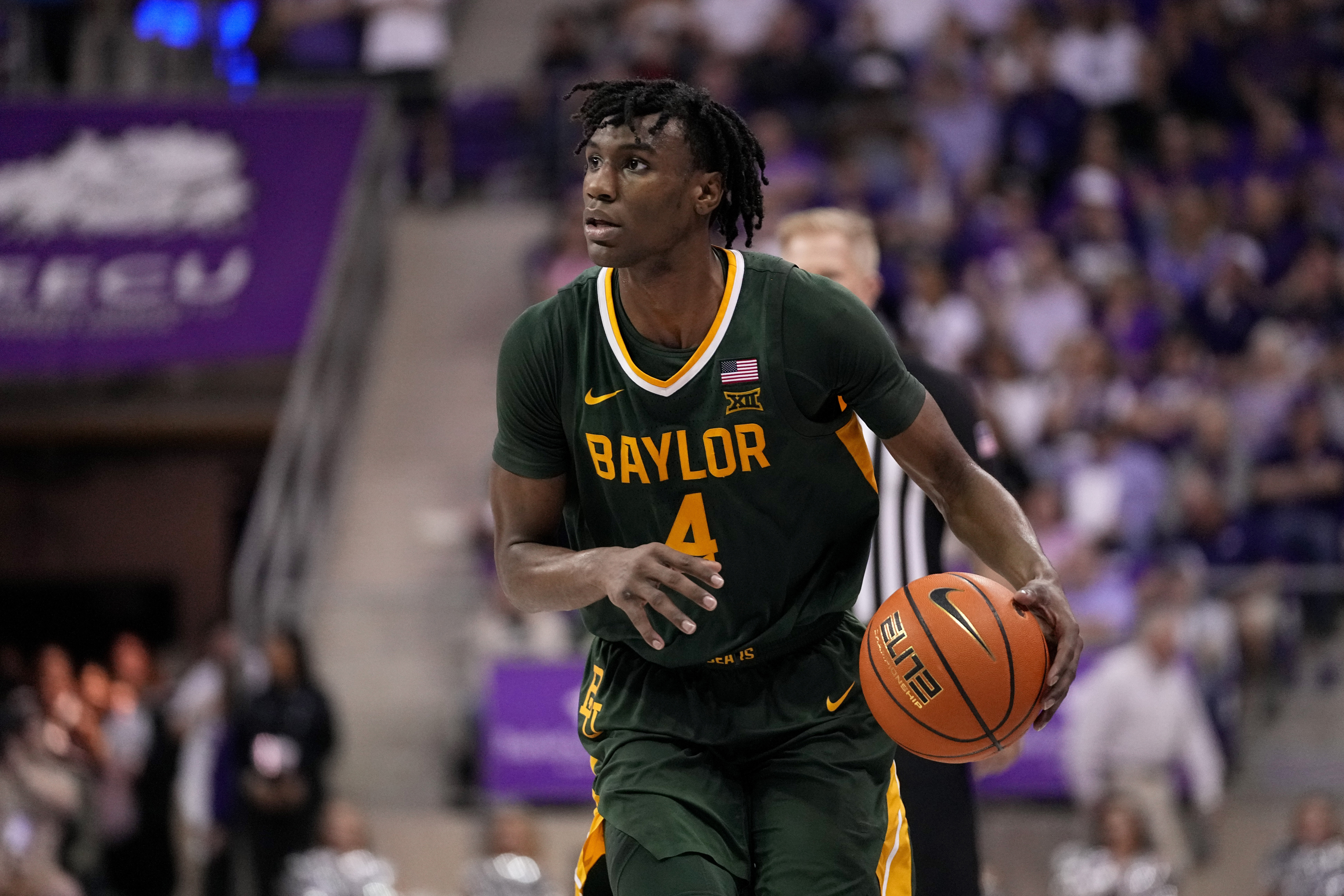 FILE - Baylor guard Ja'Kobe Walter (4) handles the ball during the second half of an NCAA college basketball game against TCU in Fort Worth, Texas, Feb. 26, 2024. 