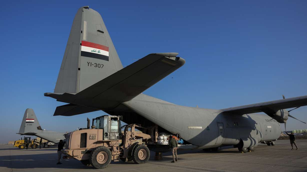 Iraqi security forces prepare for loading humanitarian aid at a military airbase near Baghdad International Airport in Baghdad, Iraq, Jan. 24. The U.S. has announced an agreement with the Iraqi government to wrap up the military mission in Iraq next year.