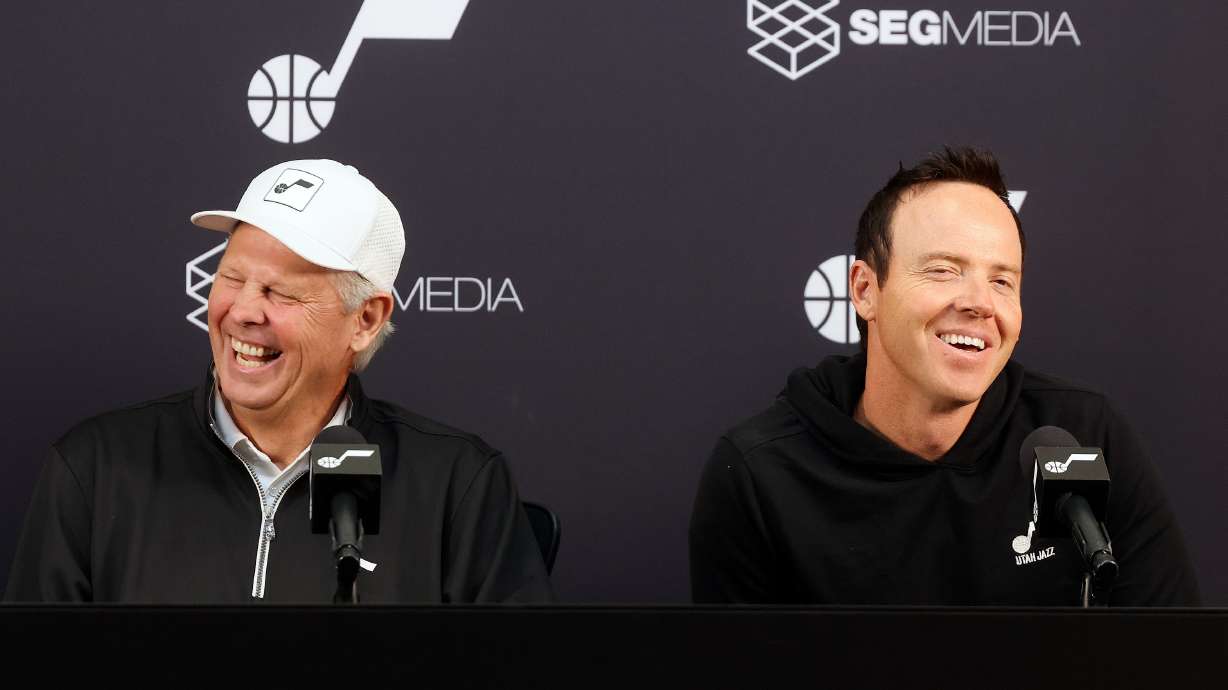 Danny Ainge, Utah Jazz CEO, and Ryan Smith, Utah Jazz governor, laugh during a press conference at the Zions Bank Basketball Campus in Salt Lake City on Friday, Sept. 27, 2024.