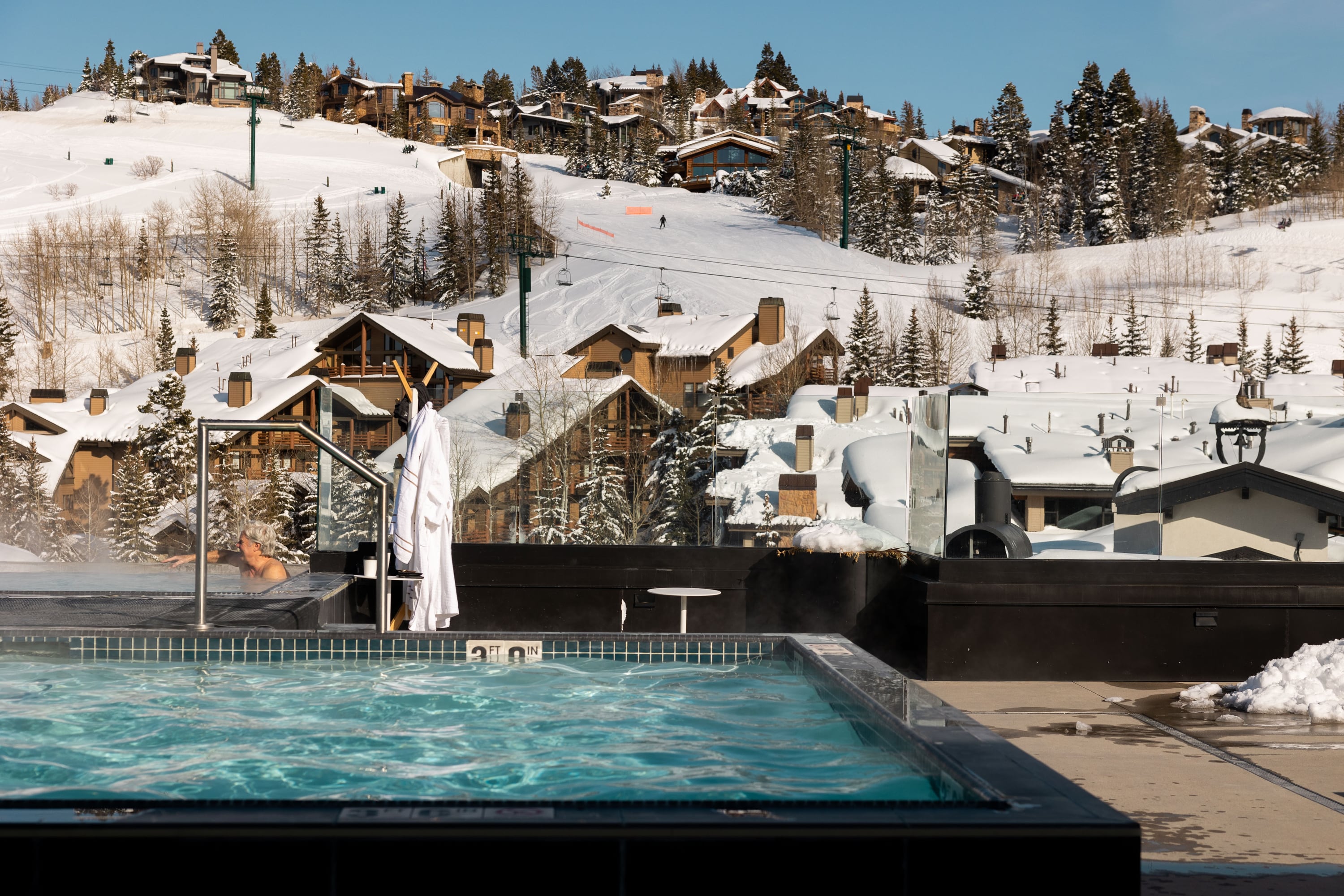 Houses in Park City overlook the pool and hot tub at the Goldener Hirsch in Park City on Feb. 23. Utah was ranked as one of the wealthiest states in the country by a U.S. News & World Report.