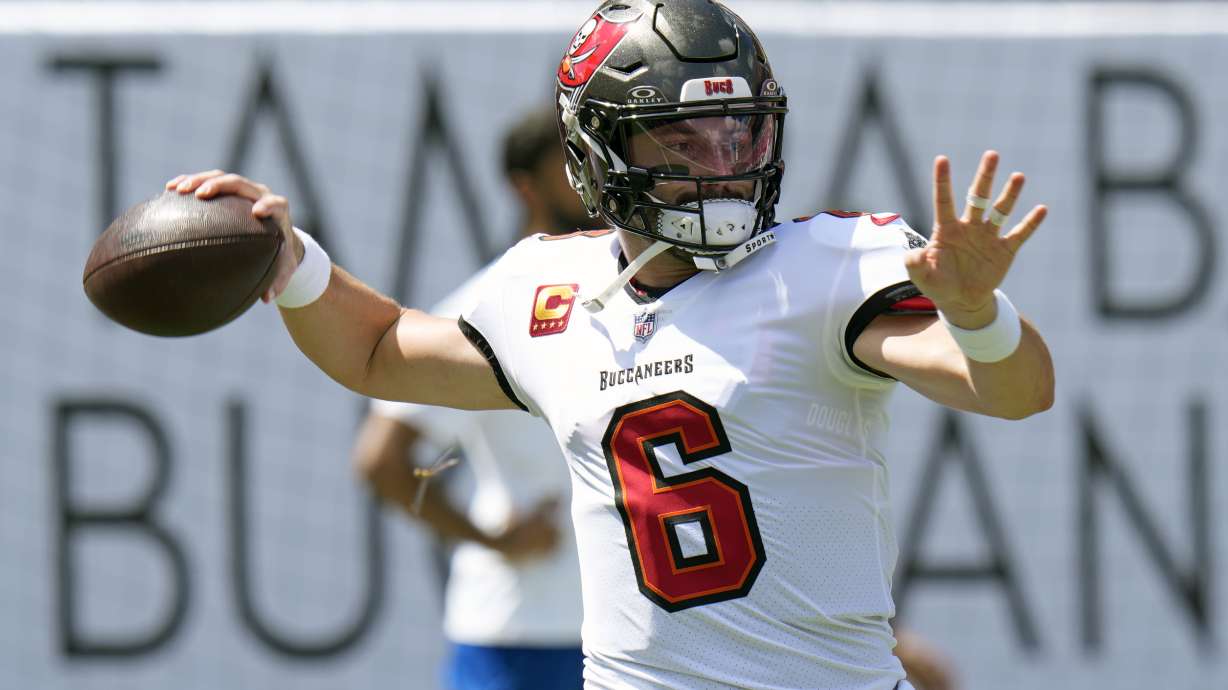 Tampa Bay Buccaneers quarterback Baker Mayfield warms up before an NFL football game against the Denver Broncos in Tampa, Fla., on Sunday, Sept. 22, 2024.
