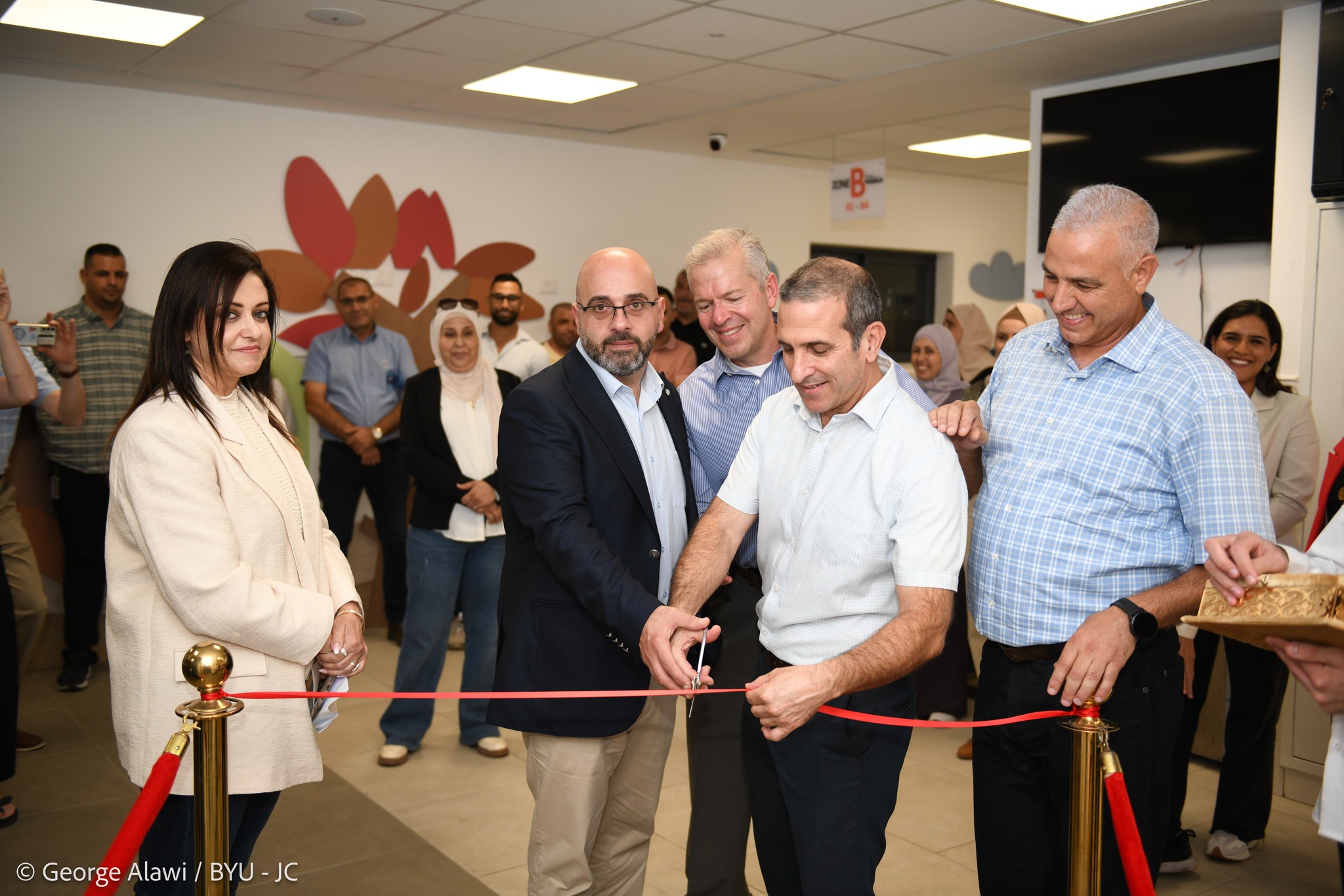 School officials participate in a ribbon cutting for the Snoezelen Room at the Al-Basma Special Education School in Beit Hanina, Jerusalem. The BYU Jerusalem Center helped fund the multi-sensory stimulation room.