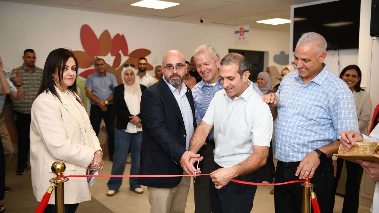 School officials participate in a ribbon cutting for the Snoezelen Room at the Al-Basma Special Education School in Beit Hanina, Jerusalem. The BYU Jerusalem Center helped fund the multi-sensory stimulation room.