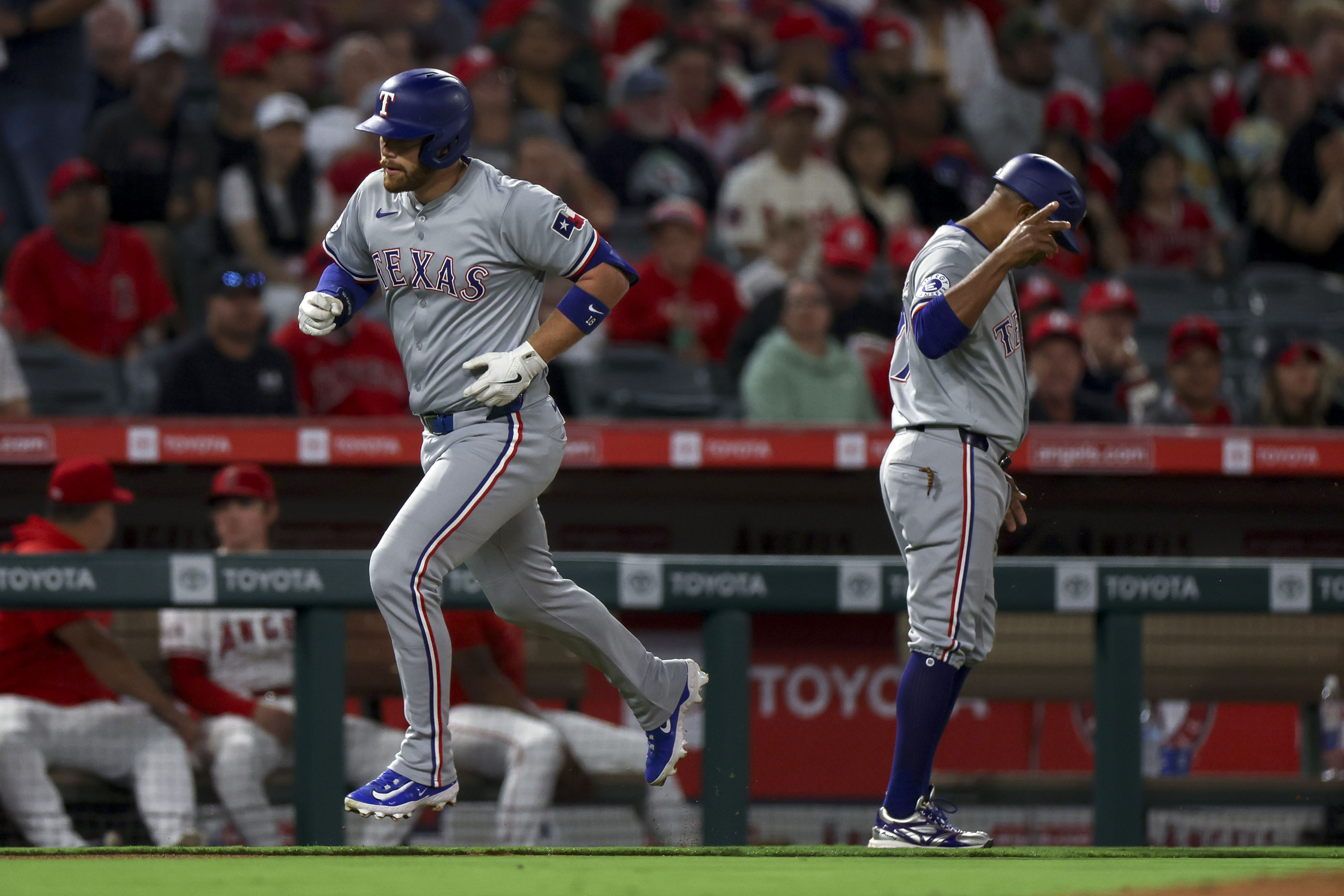 Jacob deGrom pitches 4 solid innings and the Texas Rangers hit 4 homers in a 5-2 win over the Angels