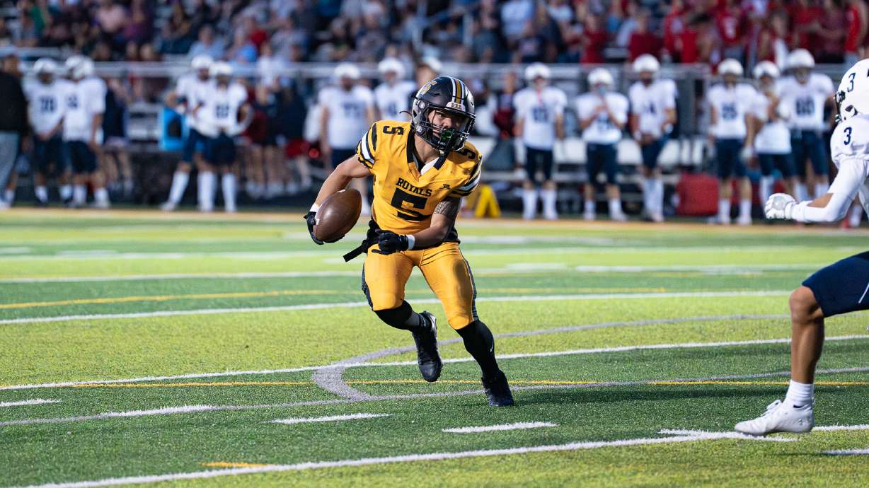 Roy High battles it out on the field against Woods Cross High in Roy on Sept. 27, 2024.