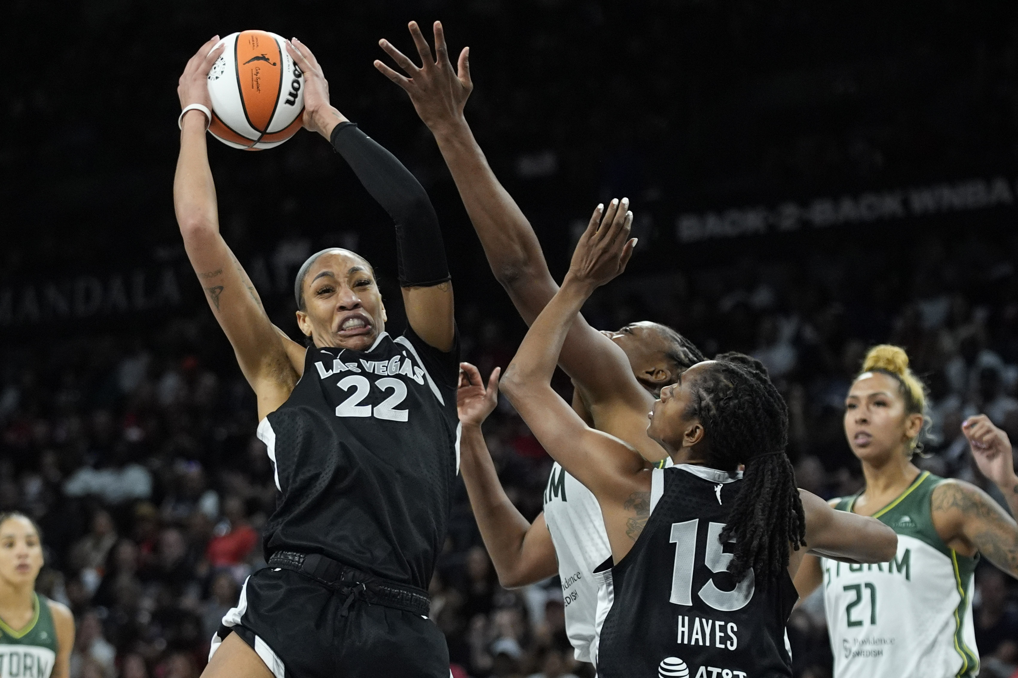 Las Vegas Aces center A'ja Wilson (22) grabs a rebound against the Seattle Storm during the second half in Game 2 of a WNBA basketball first-round playoff game Tuesday, Sept. 24, 2024, in Las Vegas. 