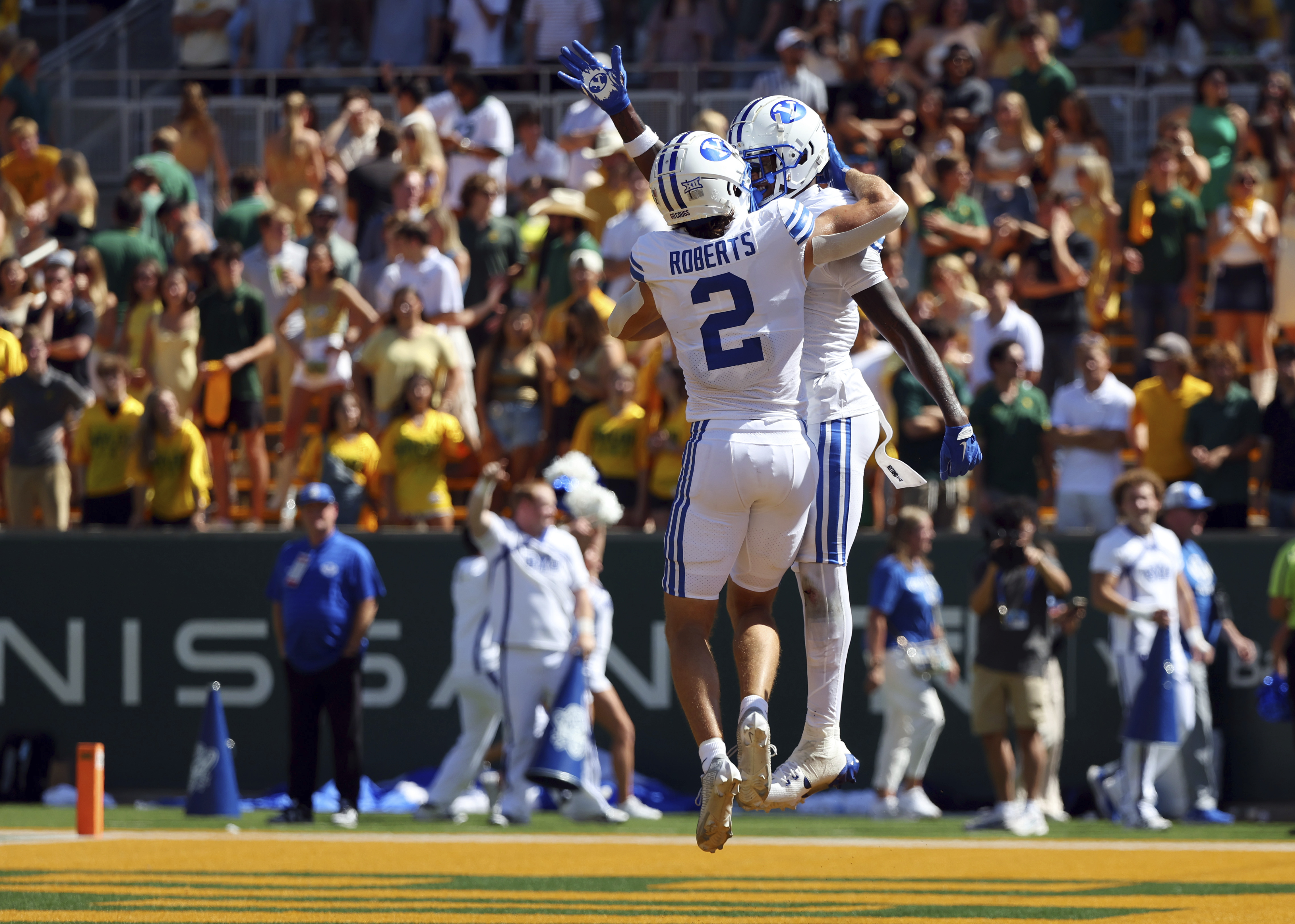 BYU wide receiver Chase Roberts (2) celebrates after a touchdown by wide receiver Darius Lassiter, right, in the second quarter against Baylor during an NCAA college football game Saturday, Sept. 28, 2024, in Waco, Texas.