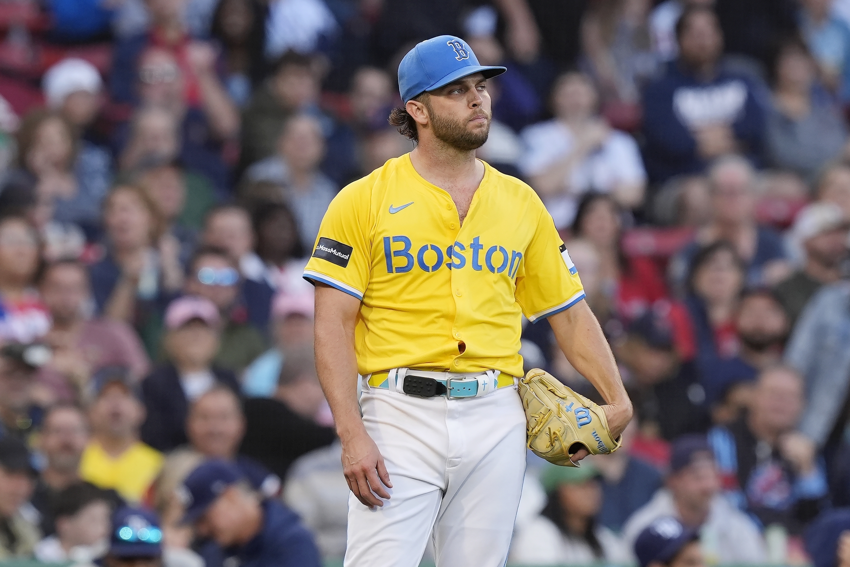 Boston Red Sox starting pitcher Kutter Crawford reacts after giving up an RBI single to Tampa Bay Rays' Junior Caminero during the fifth inning of a baseball game, Saturday, Sept. 28, 2024, in Boston.
