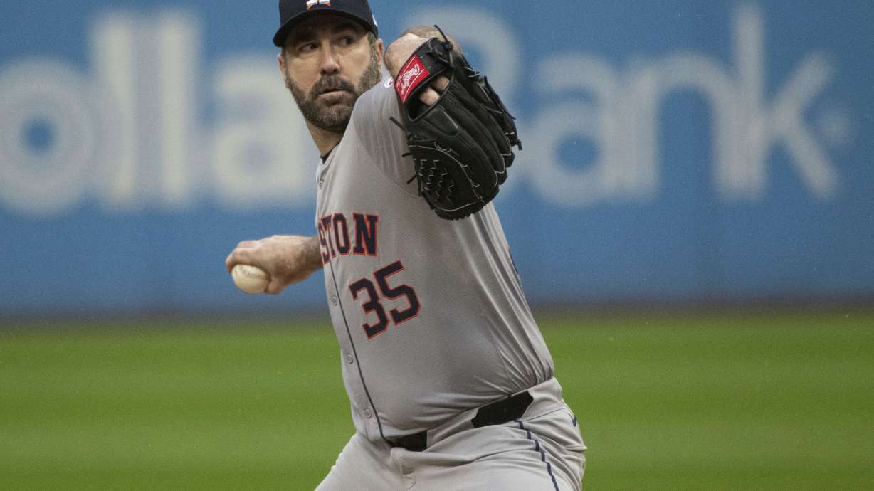 Houston Astros starting pitcher Justin Verlander delivers against the Cleveland Guardians during the first inning of a baseball game in Cleveland, Saturday, Sept. 28, 2024.