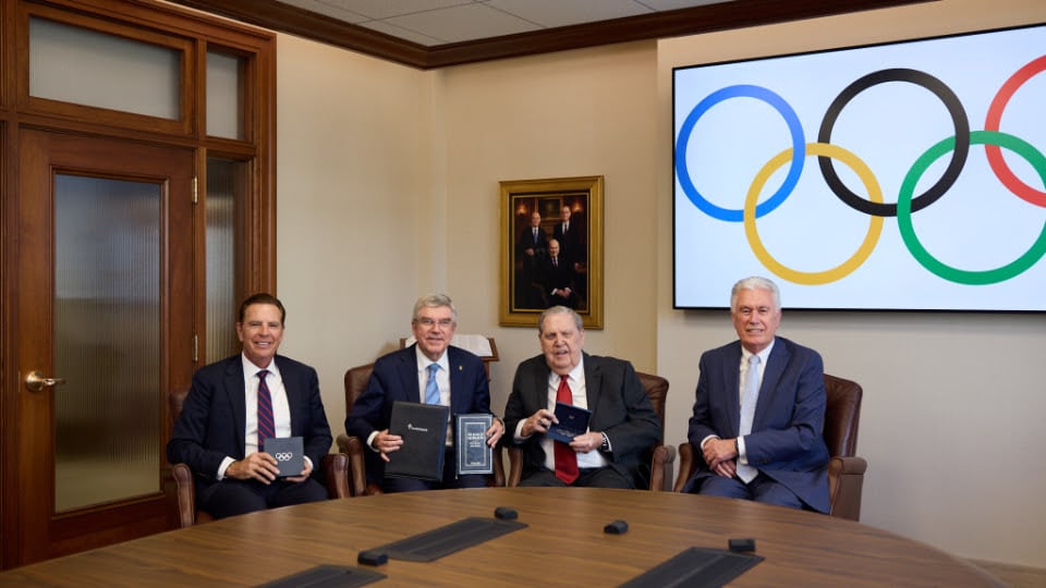 From left, Fraser Bullock, president and CEO of the Salt Lake City-Utah Committee for the Games, Thomas Bach, president of the International Olympic Committee (IOC), President Jeffrey R. Holland and Elder Dieter F. Uchtdorf of the Quorum of the Twelve Apostles meet together at the Church Administration Building in Salt Lake City on Friday. Church leaders presented Bach with a four-generation chart of his ancestors and a leather-bound copy of the Book of Mormon. Bach gave President Holland a set of Olympic rings.